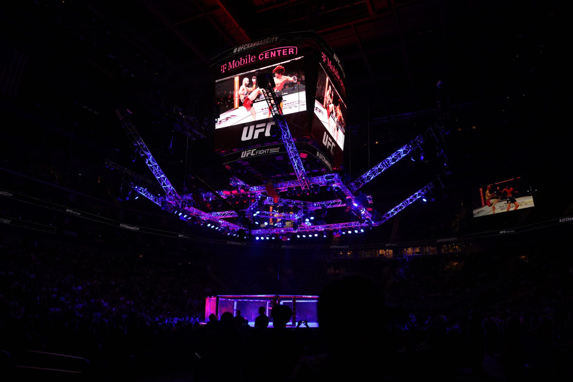 Apr 26, 2025; Kansas City, Missouri, UNITED STATES; A general view of the Octagon while Giga Chikadze (red gloves) fights David Onama (blue gloves) during UFC Fight Night at T-Mobile Center. Mandatory Credit: William Purnell-Imagn Images