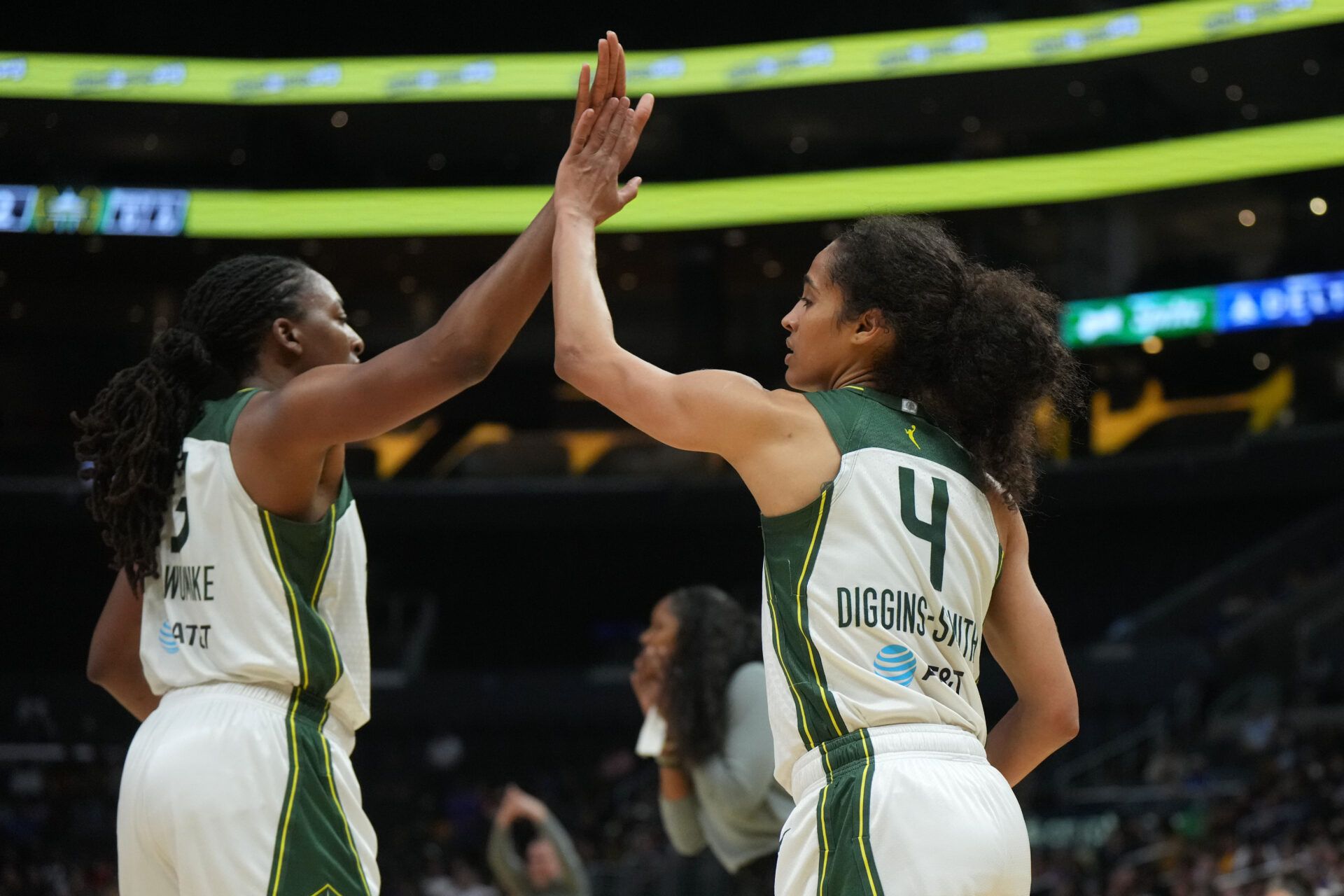 Sep 11, 2024; Los Angeles, California, USA; Seattle Storm forward Nneka Ogwumike (3) and guard Skylar Diggins-Smith (4) celebrate against the LA Sparks in the second half at Crypto.com Arena. Mandatory Credit: Kirby Lee-Imagn Images