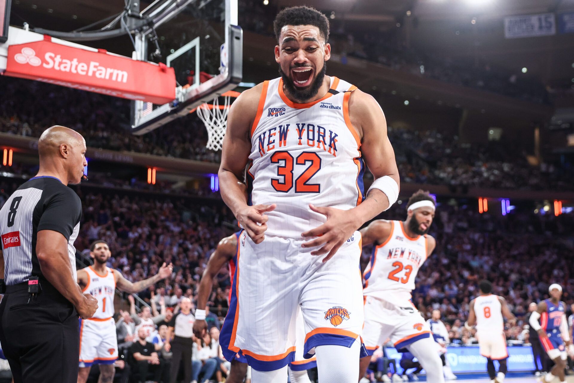 Apr 29, 2025; New York, New York, USA; New York Knicks center Karl-Anthony Towns (32) reacts after being called for a foul in the fourth quarter against the Detroit Pistons during game five of first round for the 2025 NBA Playoffs at Madison Square Garden. Mandatory Credit: Wendell Cruz-Imagn Images