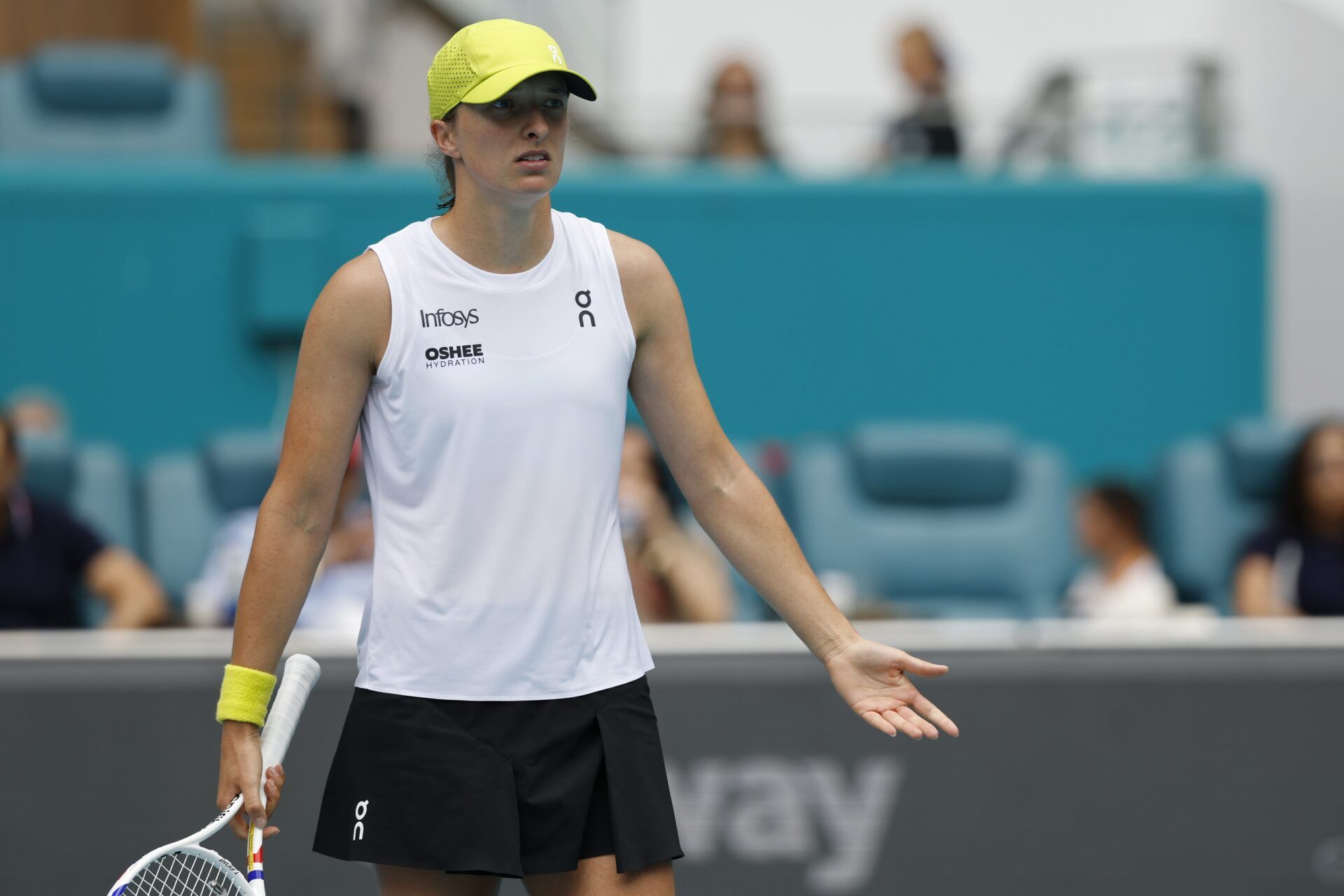 Mar 23, 2025; Miami, FL, USA; Iga Swiatek (POL) gestures toward her box after missing a shot against Elise Mertens (BEL)(not pictured) on day six of the Miami Open at Hard Rock Stadium. Mandatory Credit: Geoff Burke-Imagn Images