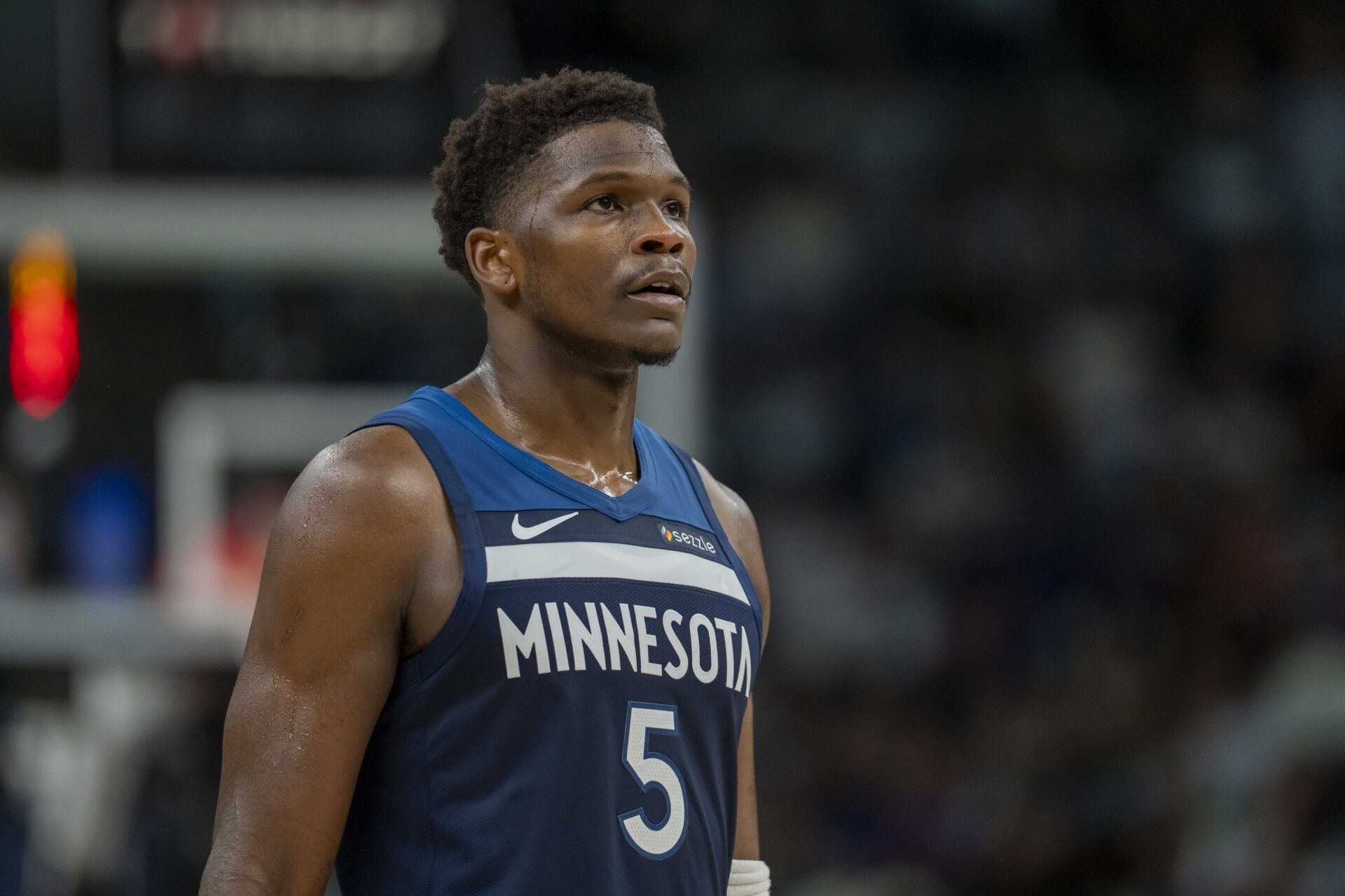 Minnesota Timberwolves guard Anthony Edwards (5) looks on against the Los Angeles Lakers in the second half during game three of first round for the 2024 NBA Playoffs at Target Center.