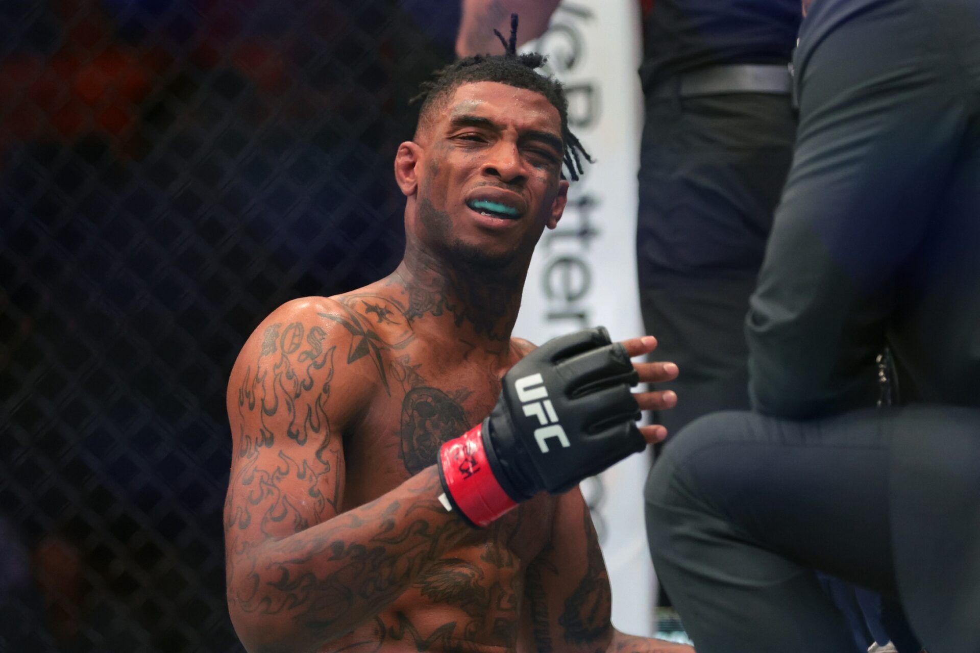 Apr 12, 2025; Miami, Florida, UNITED STATES; Sedriques Dumas (red gloves) reacts after his loss to Michal Oleksiejczuk (not pictured) during UFC 314 at Kaseya Center. Mandatory Credit: Sam Navarro-Imagn Images