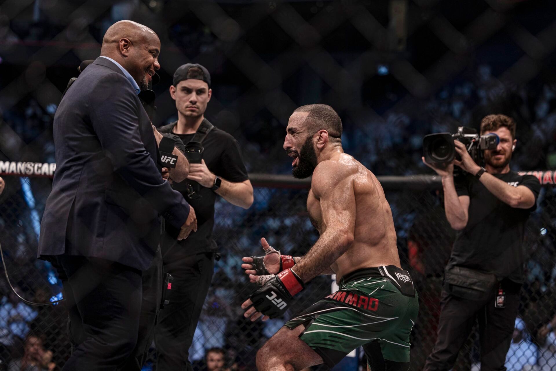 Oct 22, 2022; Abu Dhabi, UAE; Belal Muhammad (red gloves) defeats Sean Brady (blue gloves) during UFC 280 at Etihad Arena. Mandatory Credit: Craig Kidwell-USA TODAY Sports