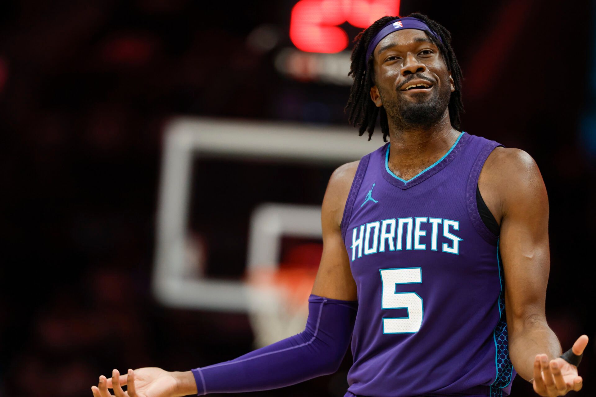 Apr 6, 2025; Charlotte, North Carolina, USA; Charlotte Hornets center Mark Williams (5) reacts to an official’s call during the second half against the Chicago Bulls at Spectrum Center. Mandatory Credit: Nell Redmond-Imagn Images
