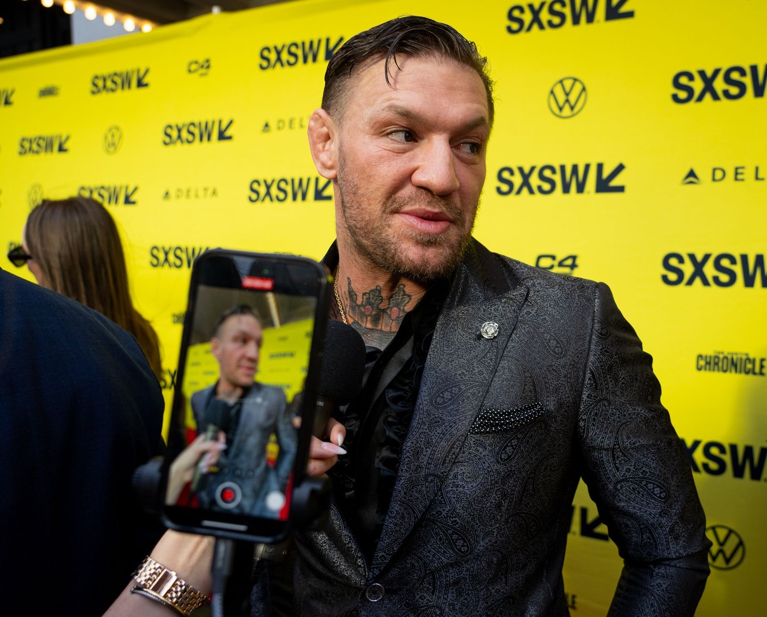 March 8, 2024; Austin TX; Conor McGregor speaks to press on the red carpet before the premiere of Roadhouse at the Paramount Theatre in Austin, Texas on the first day of South by Southwest, Friday, March 8, 2024. McGregor plays the character “Knox” in the movie.. Mandatory Credit: Sara Diggins-USA TODAY NETWORK