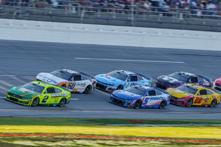 Apr 26, 2025; Talladega, Alabama, USA; NASCAR Cup Series driver Austin Cindric (2) leads the pack into turn one at Talladega Superspeedway. Mandatory Credit: Jason Allen-Imagn Images