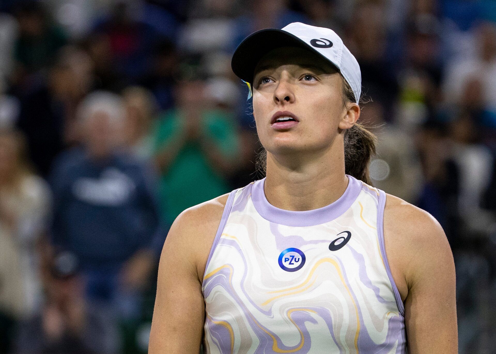 Iga Świątek let out an expletive in frustration during her loss to Coco Gauff at the Madrid Open, resulting in a code violation from the chair umpire.