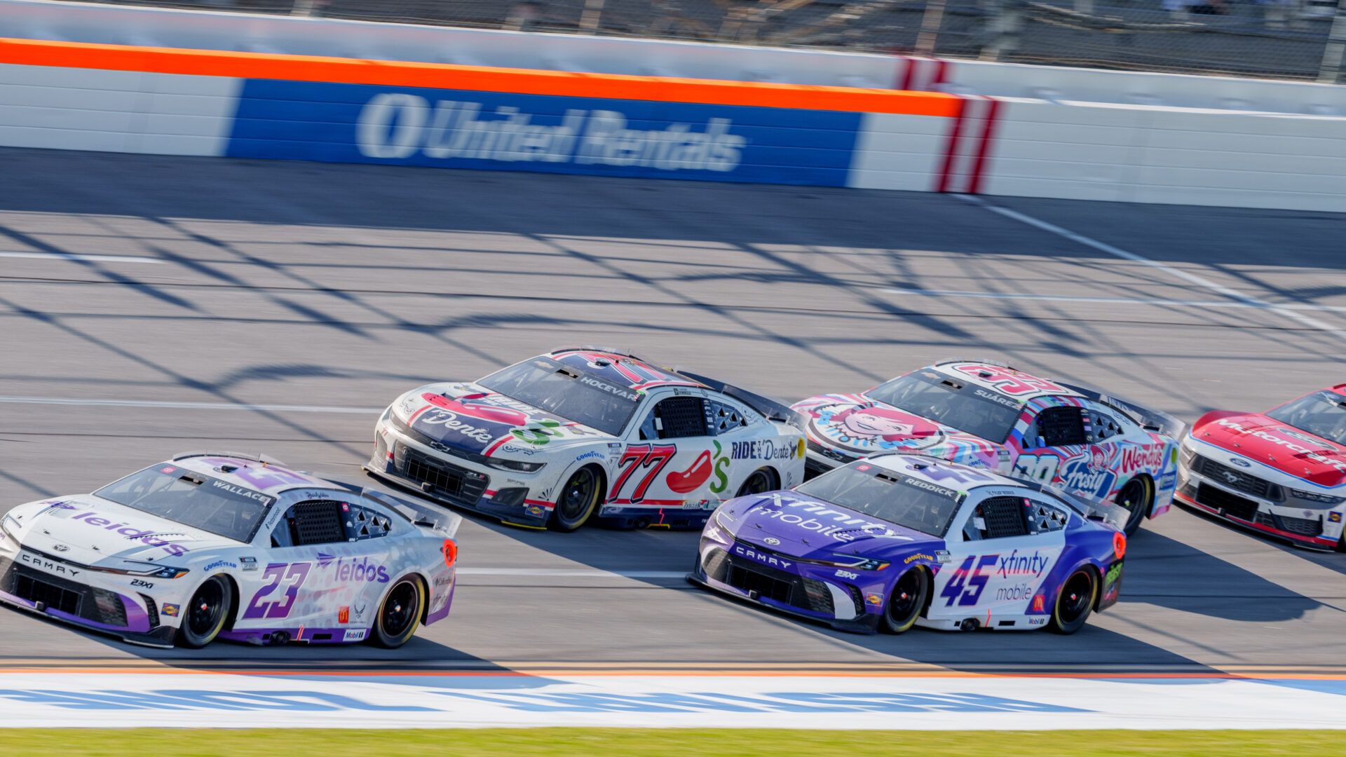 Apr 26, 2025; Talladega, Alabama, USA; The pack goes into turn one at Talladega Superspeedway. Mandatory Credit: Jason Allen-Imagn Images