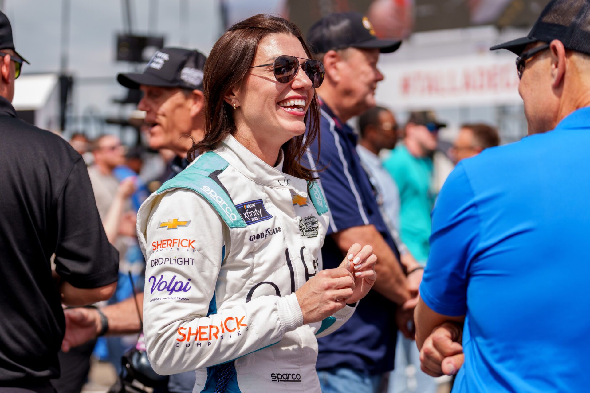 Apr 26, 2025; Talladega, Alabama, USA; Xfinity Series driver Katherine Legge (32) speaks with fans before the race at Talladega Superspeedway. Mandatory Credit: Jason Allen-Imagn Images