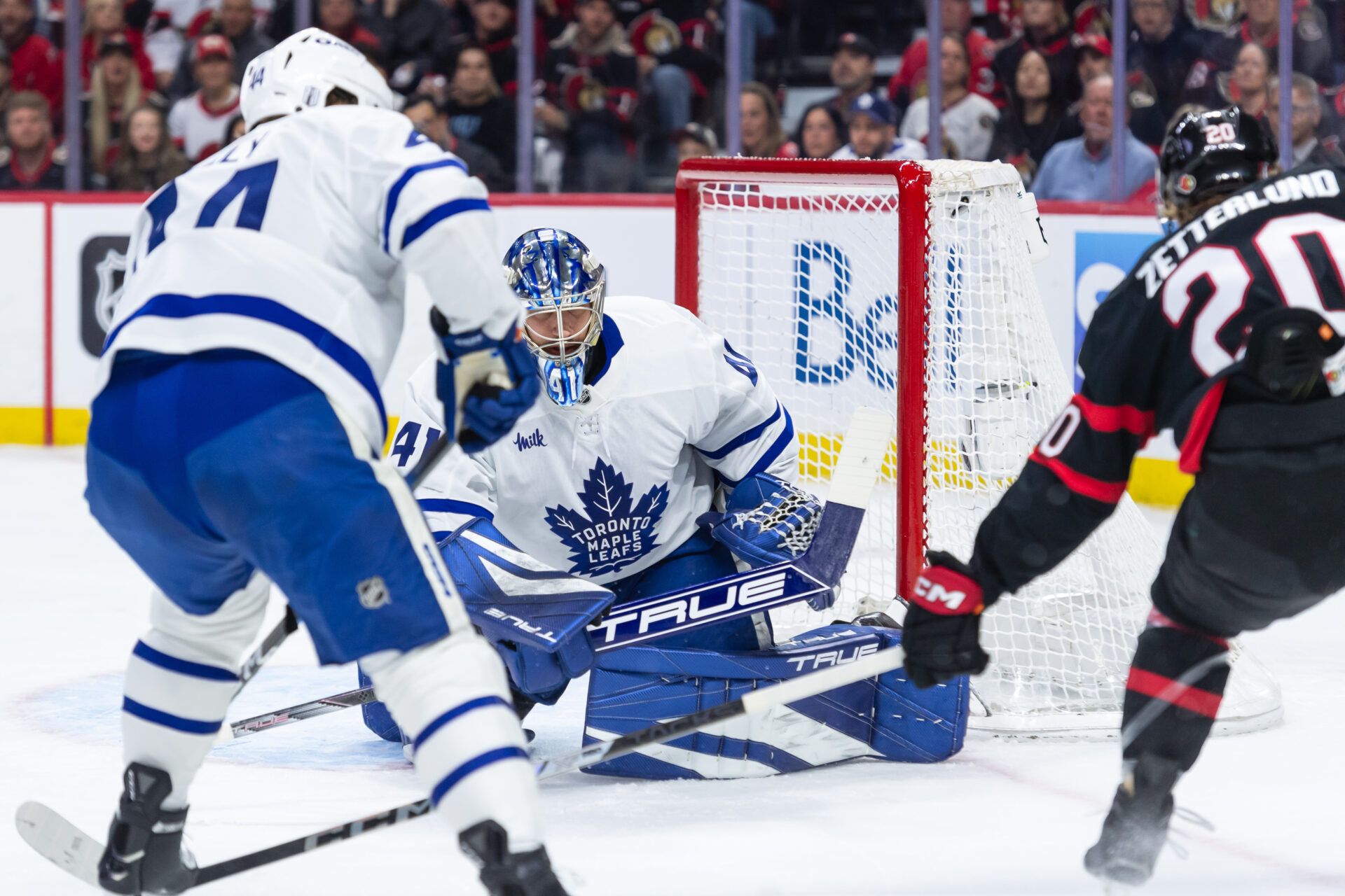 May 1, 2025; Ottawa, Ontario, CAN; Toronto Maple Leafs goalie Anthony Stolarz (41) makes a save on a shot from Ottawa Senators left wing Fabian Zetterlund (20) in game six of the first round of the 2025 Stanley Cup Playoffs at Canadian Tire Centre. Mandatory Credit: Marc DesRosiers-Imagn Images
