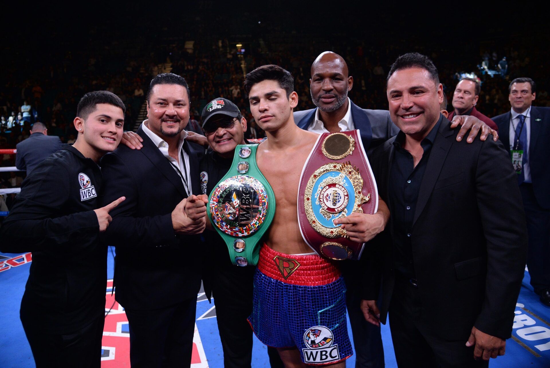 Ryan Garcia (blue trunks) celebrates after knocking out Romero Duno (not pictured) in their WBC silver and NABO lightweight title bout at MGM Grand Garden Arena. Garcia won via first round TKO.