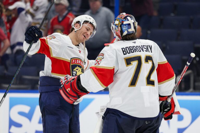 Apr 24, 2025; Tampa, Florida, USA; Florida Panthers left wing Matthew Tkachuk (19) congratulates goaltender Sergei Bobrovsky (72) after beating the Tampa Bay Lightning in game two of the first round of the 2025 Stanley Cup Playoffs at Amalie Arena. Mandatory Credit: Nathan Ray Seebeck-Imagn Images