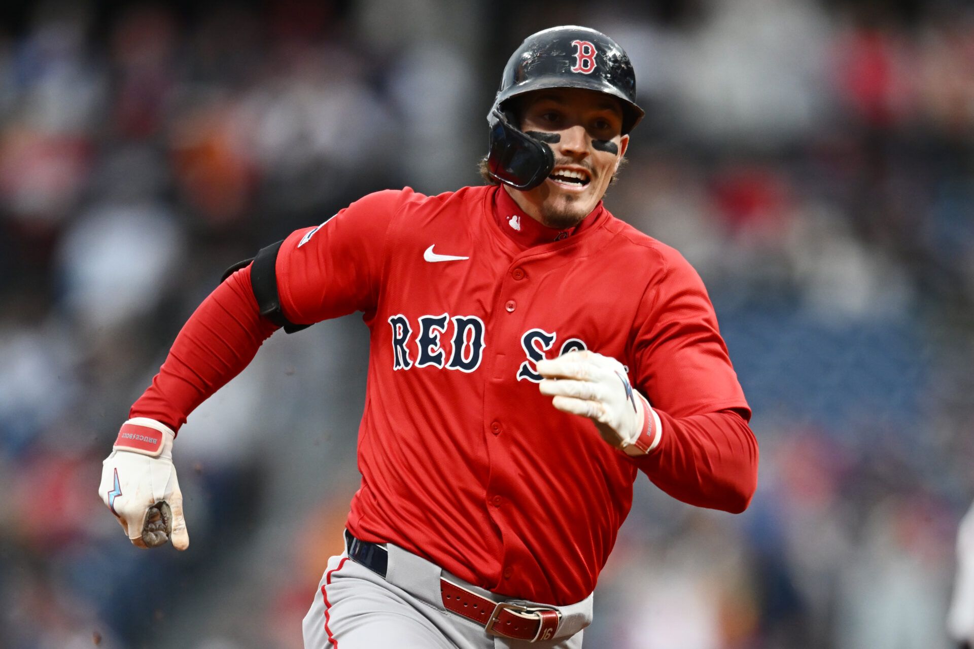 Boston Red Sox left fielder Jarren Duran (16) rounds the bases en route to a triple during the second inning against the Cleveland Guardians at Progressive Field.