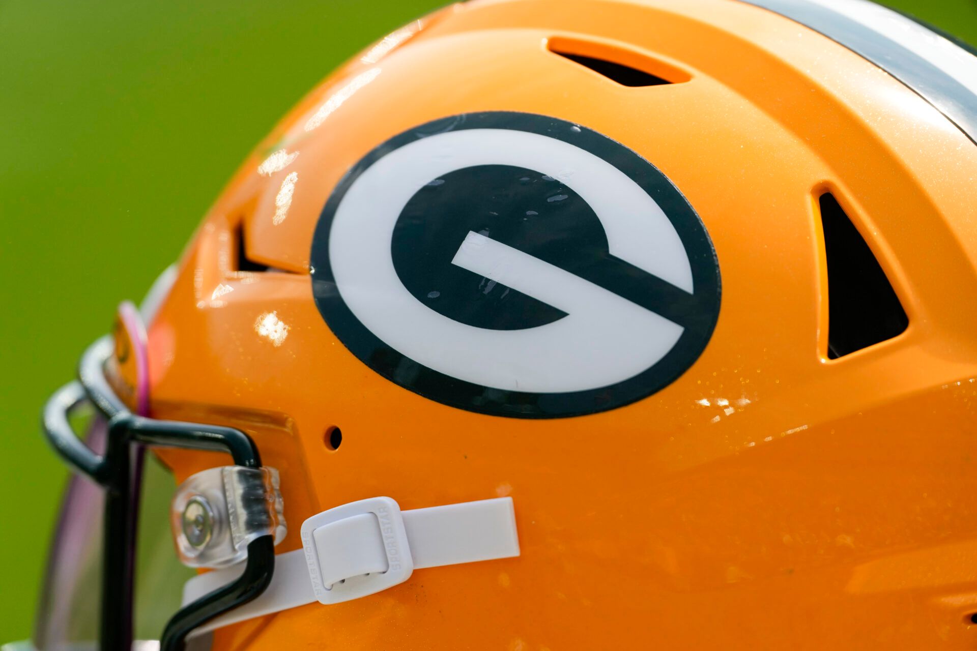 Aug 24, 2024; Green Bay, Wisconsin, USA; General view of a Green Bay Packers helmet during warmups prior to the game against the Baltimore Ravens at Lambeau Field. Mandatory Credit: Jeff Hanisch-USA TODAY Sports