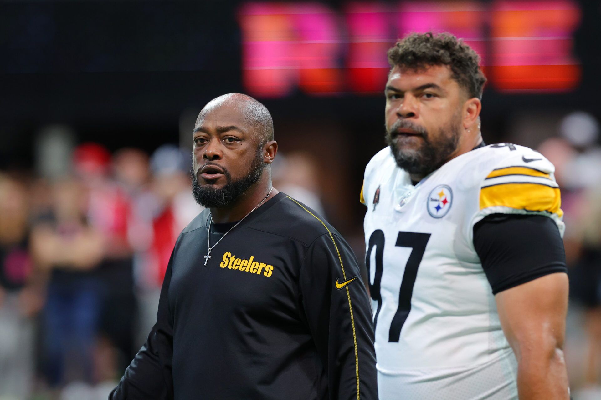 ATLANTA, GEORGIA - SEPTEMBER 08: Head coach Mike Tomlin of the Pittsburgh Steelers and Cameron Heyward #97 of the Pittsburgh Steelers looks on prior to a game against the Atlanta Falcons at Mercedes-Benz Stadium on September 08, 2024 in Atlanta, Georgia. (Photo by Kevin C. Cox/Getty Images)
