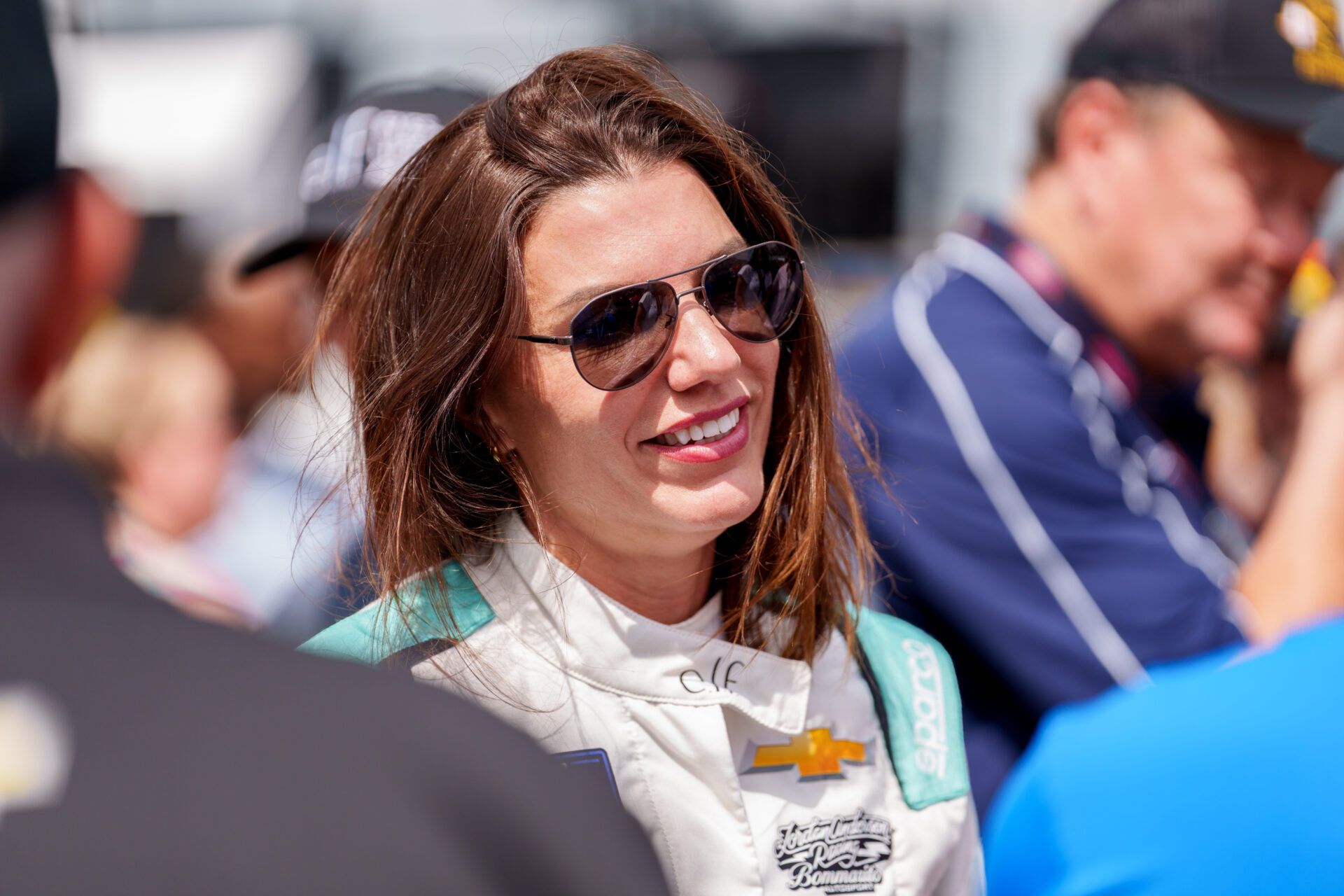 Apr 26, 2025; Talladega, Alabama, USA; Xfinity Series driver Katherine Legge (32) speaks with fans before the race at Talladega Superspeedway. Mandatory Credit: Jason Allen-Imagn Images