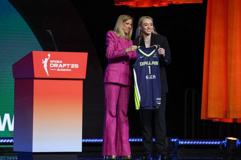 Paige Bueckers poses with WNBA commissioner Cathy Engelbert after being selected with the number one overall pick to the Dallas Wings in the 2025 WNBA Draft at The Shed at Hudson Yards.