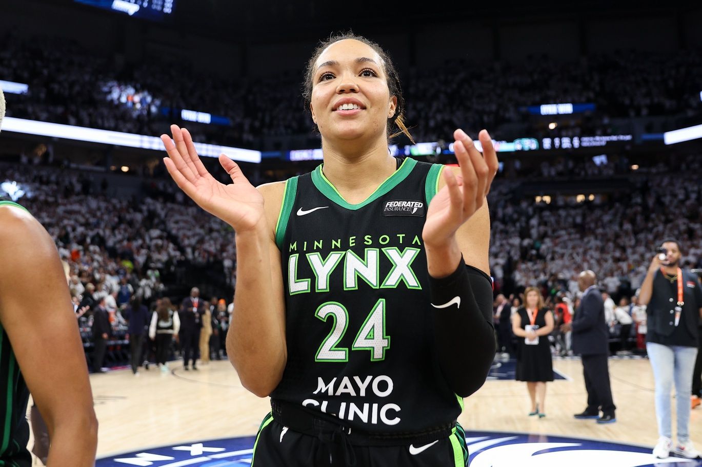 Minnesota Lynx forward Napheesa Collier (24) celebrates her teams win after game four of the 2024 WNBA Finals against the New York Liberty at Target Center.