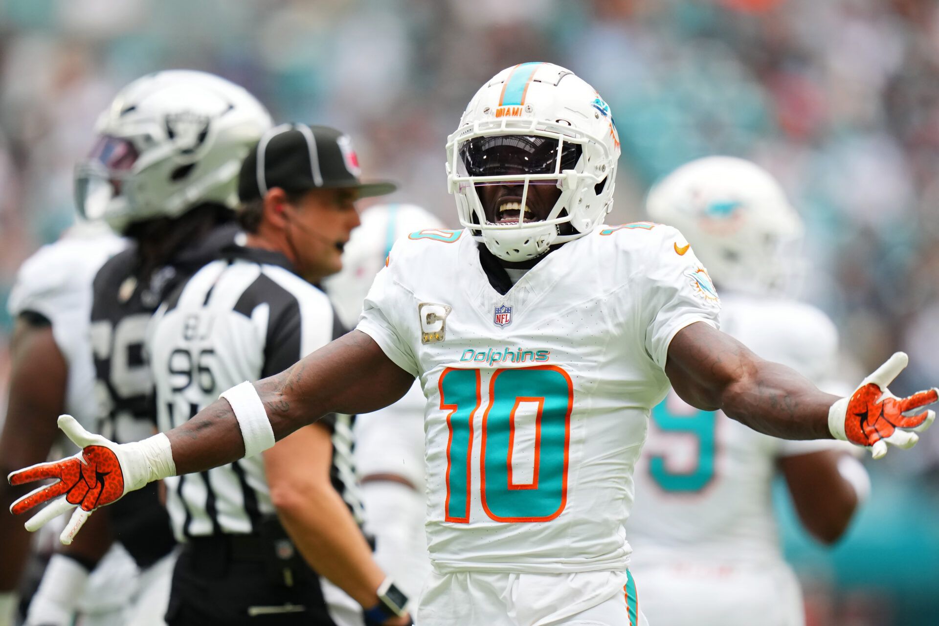 MIAMI GARDENS, FLORIDA - NOVEMBER 17: Tyreek Hill #10 of the Miami Dolphins reacts after a play in the first quarter of a game against the Las Vegas Raiders at Hard Rock Stadium on November 17, 2024 in Miami Gardens, Florida. (Photo by Rich Storry/Getty Images)