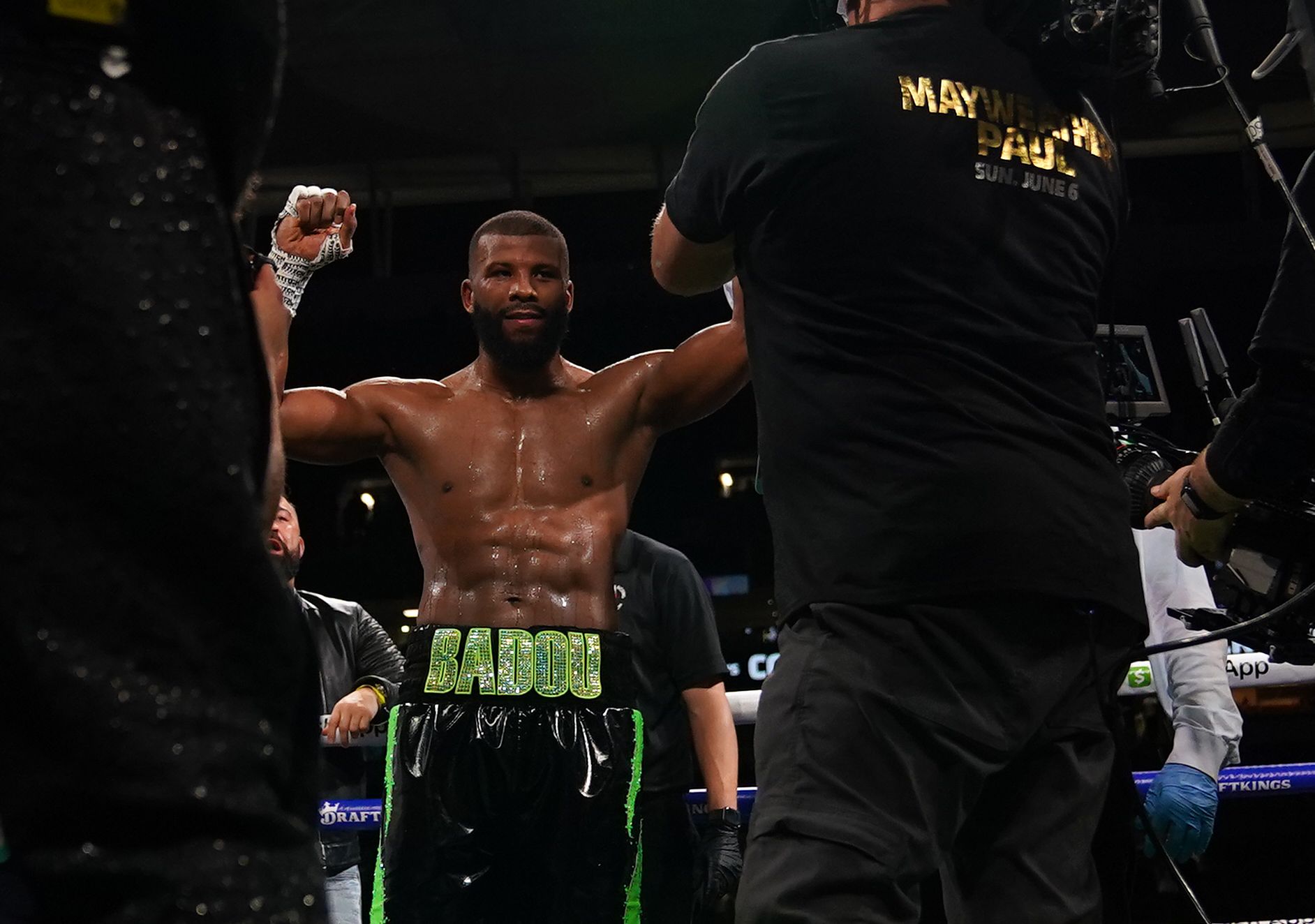 Jun 6, 2021; Miami, Florida, USA; Badou Jack (Black/Green Trunks) celebrates after a TKO of Dervin Colina (not pictured) during an exhibition boxing match at Hard Rock Stadium. Mandatory Credit: Jasen Vinlove-USA TODAY Sports