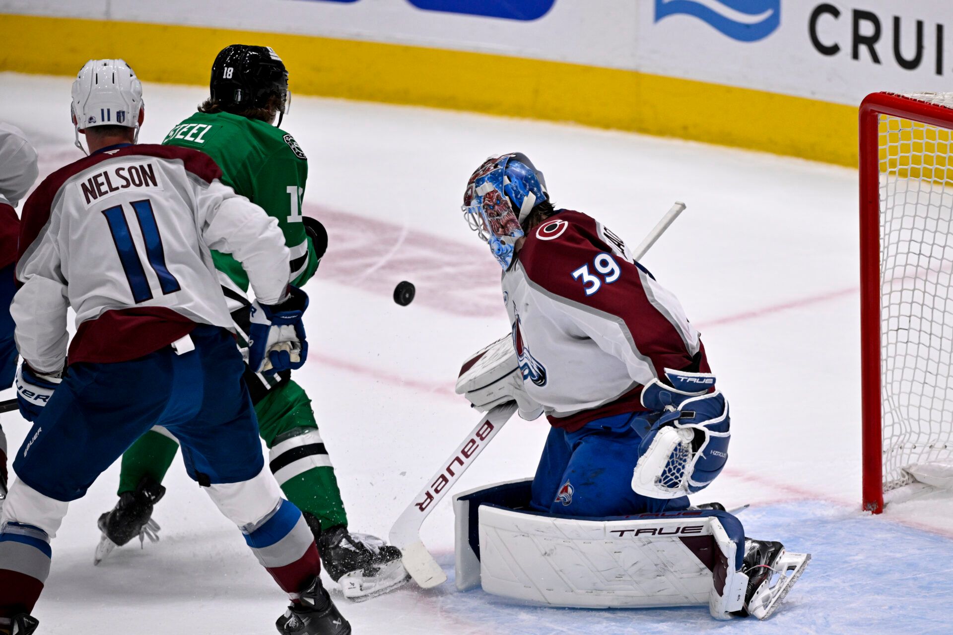 May 3, 2025; Dallas, Texas, USA; Colorado Avalanche goaltender Mackenzie Blackwood (39) stops a shot by Dallas Stars center Sam Steel (18) during the second period in game seven of the first round of the 2025 Stanley Cup Playoffs at American Airlines Center. Mandatory Credit: Jerome Miron-Imagn Images