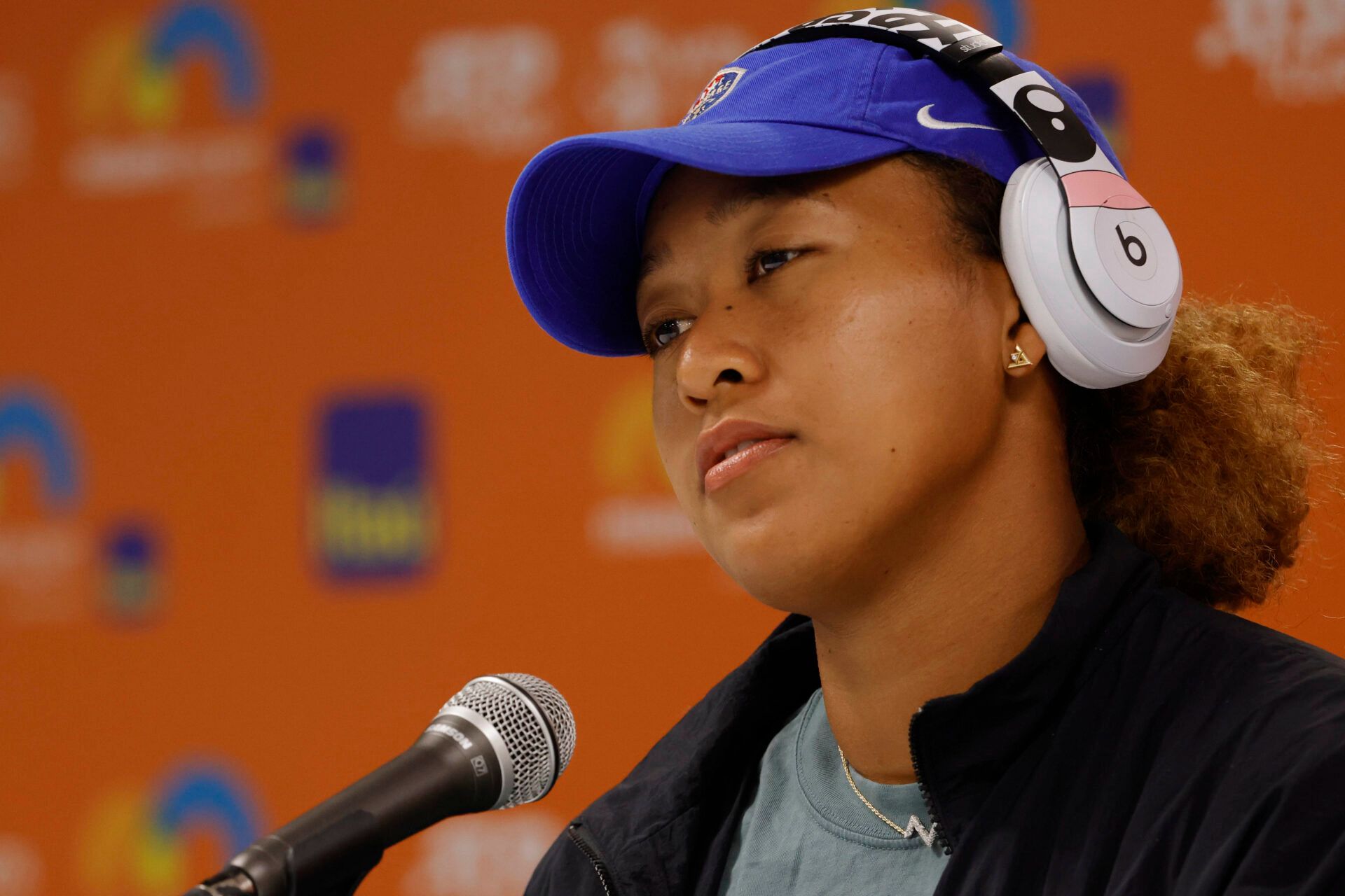 Naomi Osaka took a playful shot at her critics with a fake job application post on social media, just ahead of her final in Saint-Malo.