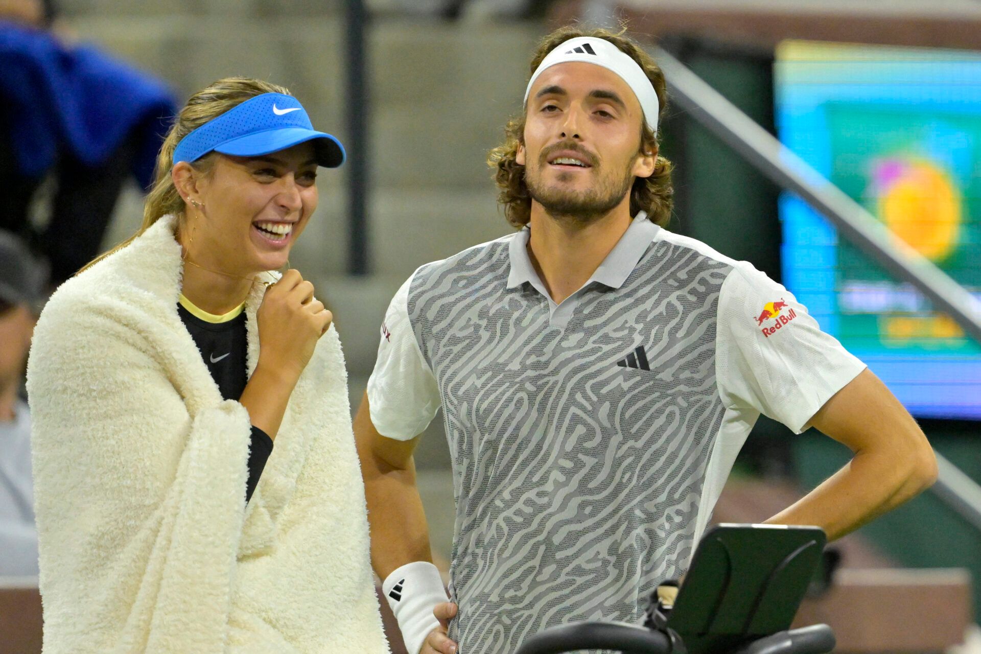 Mar 5, 2024; Indian Wells, CA, USA; Paula Badosa and Stefanos Tsitsipas watch the action in the Eisenhower Cup Tie Break Tens event featuring mixed doubles during the BNP Paribas Open at the Indian Wells Tennis Garden. Mandatory Credit: Jayne Kamin-Oncea-Imagn Images