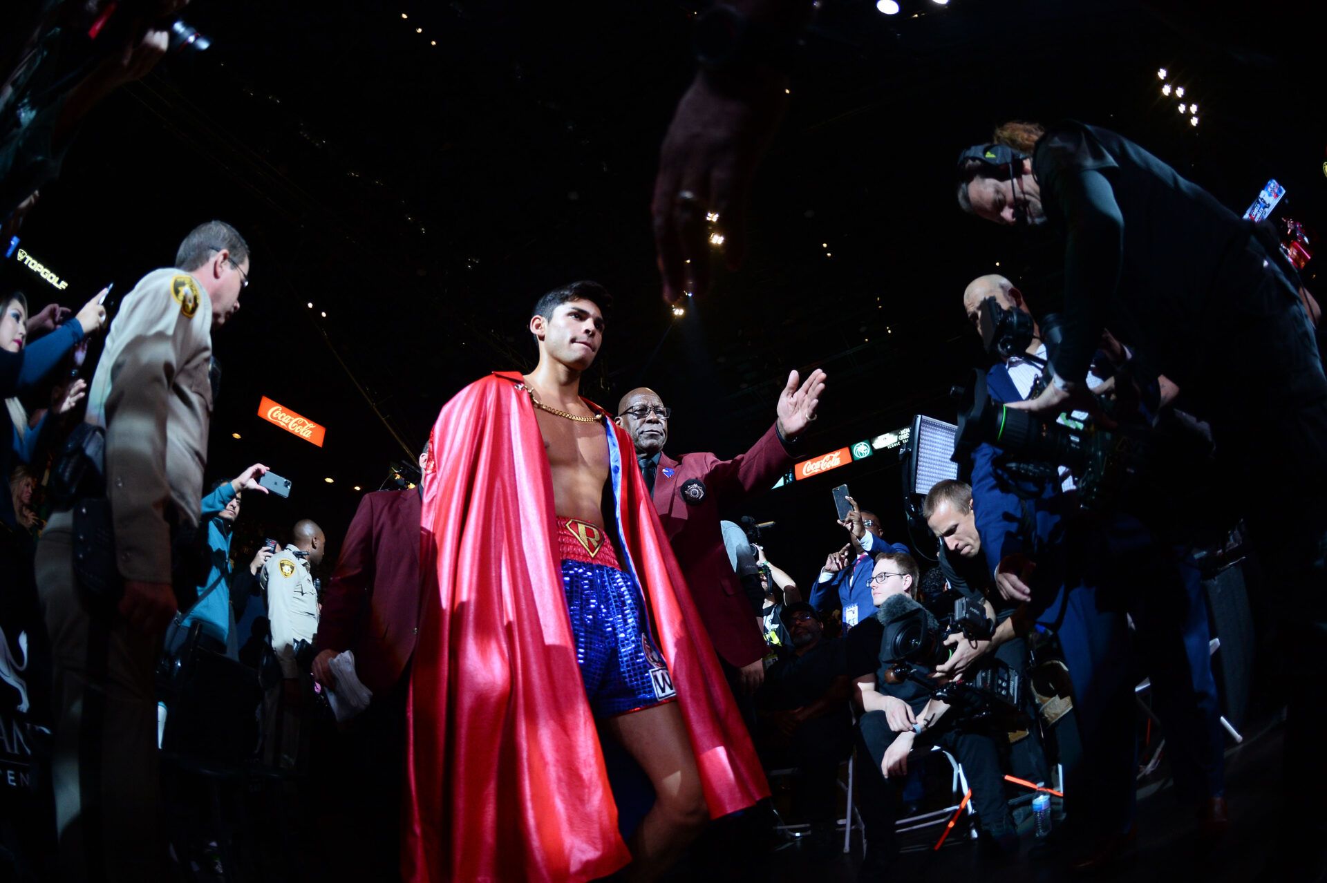 Nov 2, 2019; Las Vegas, NV, USA; Ryan Garcia (blue trunks) enters the arena to face Romero Duno (not pictured) for their WBC silver and NABO lightweight title bout at MGM Grand Garden Arena. Garcia won via first round TKO. Mandatory Credit: Joe Camporeale-USA TODAY Sports