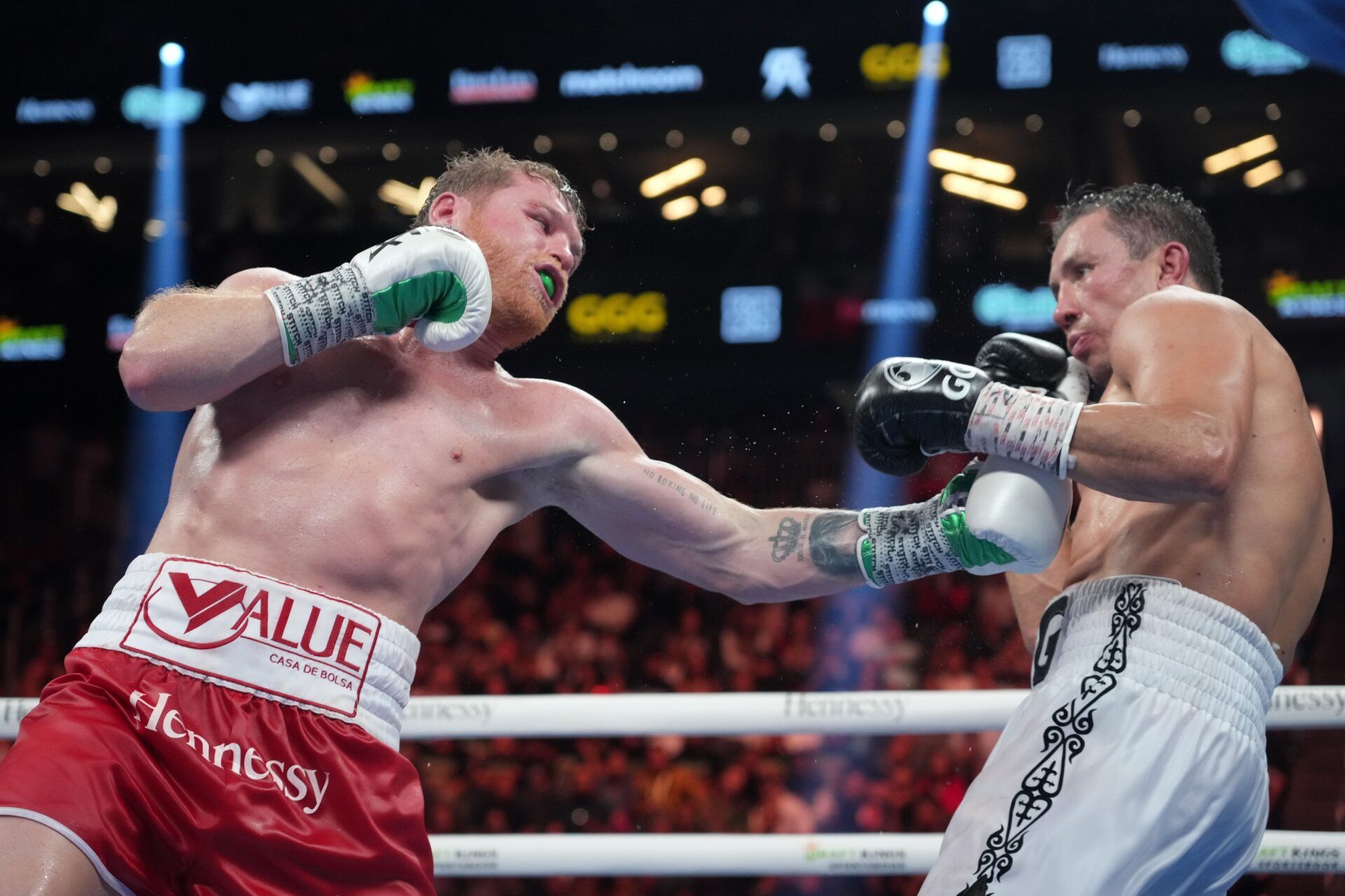 Sep 17, 2022; Las Vegas, Nevada, USA; Canelo Alvarez (red trunks) and Gennadiy Golovkin (white trunks) box during a super middleweight championship bout at T-Mobile Arena. Mandatory Credit: Joe Camporeale-USA TODAY Sports