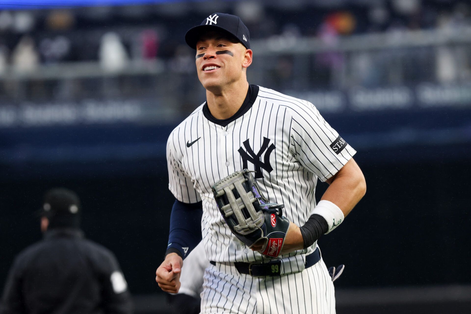 New York Yankees outfielder Aaron Judge (99) reacts after catching a pop fly against the San Francisco Giants during the eighth inning at Yankee Stadium. Mandatory: Tom Horak-Imagn Images