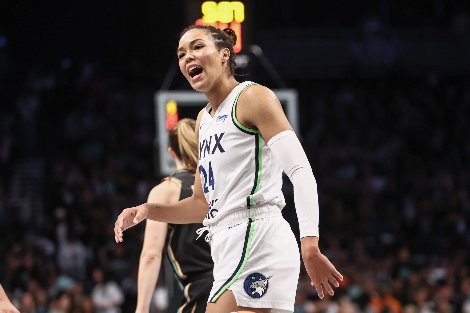 Minnesota Lynx forward Napheesa Collier (24) argues with an official after being called for traveling in the second quarter against the New York Liberty during game five of the 2024 WNBA Finals at Barclays Center.