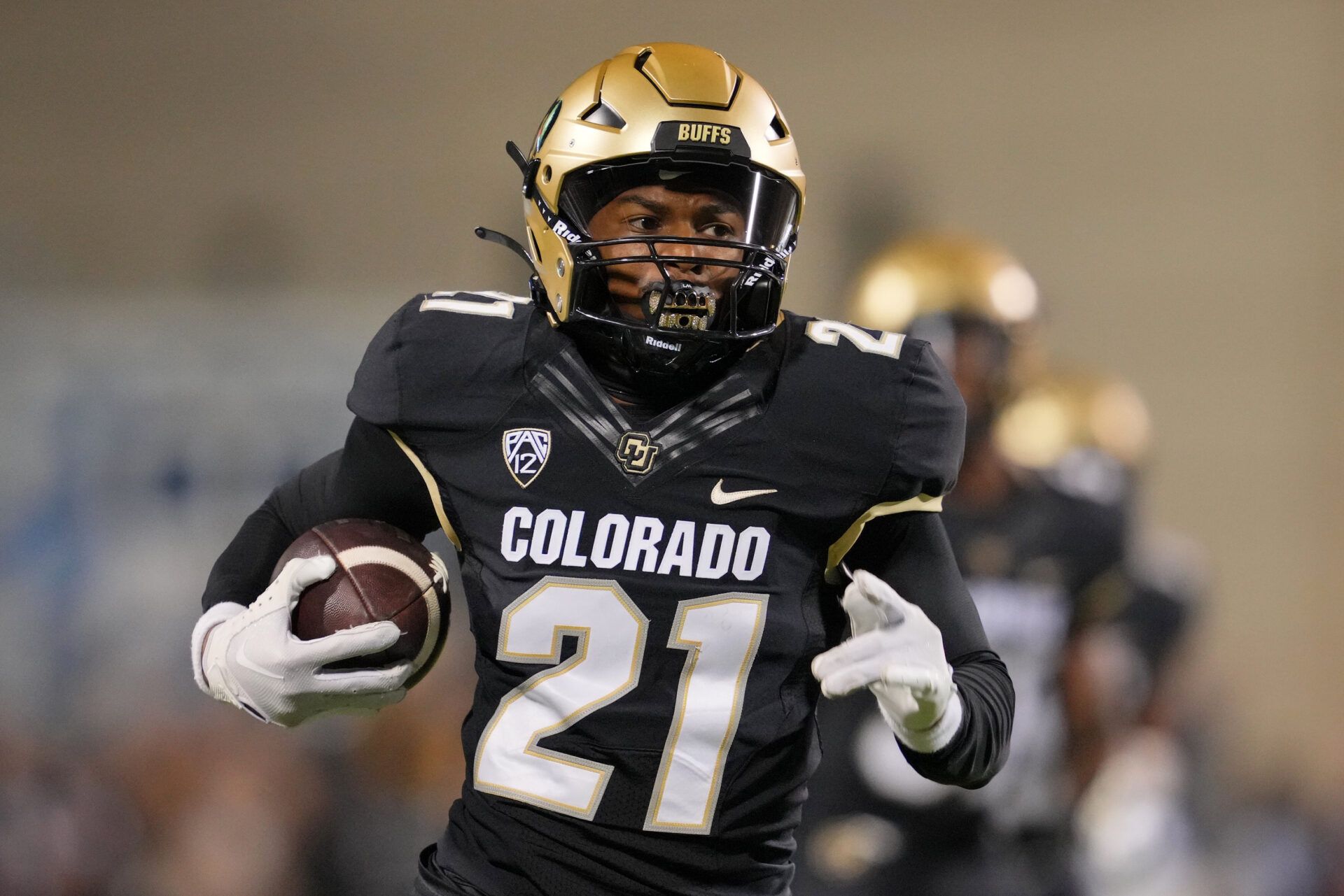 Sep 16, 2023; Boulder, Colorado, USA; Colorado Buffaloes safety Shilo Sanders (21) runs for a touchdown after making an interception against the Colorado State Rams during the first half at Folsom Field. Mandatory Credit: Andrew Wevers-USA TODAY Sports