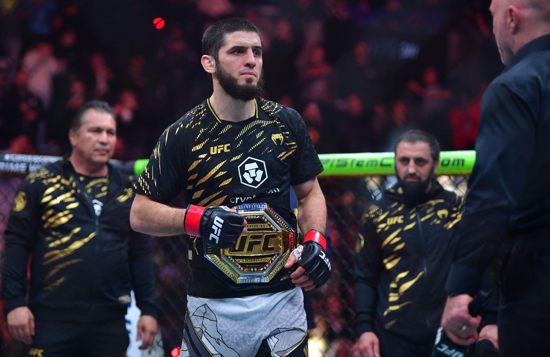 Jan 18, 2025; Inglewood, California, USA; Islam Makhachev (red gloves) reacts after defeating Renato Moicano (not pictured) in a lightweight title fight during UFC 311 at Intuit Dome. Mandatory Credit: Gary A. Vasquez-Imagn Images