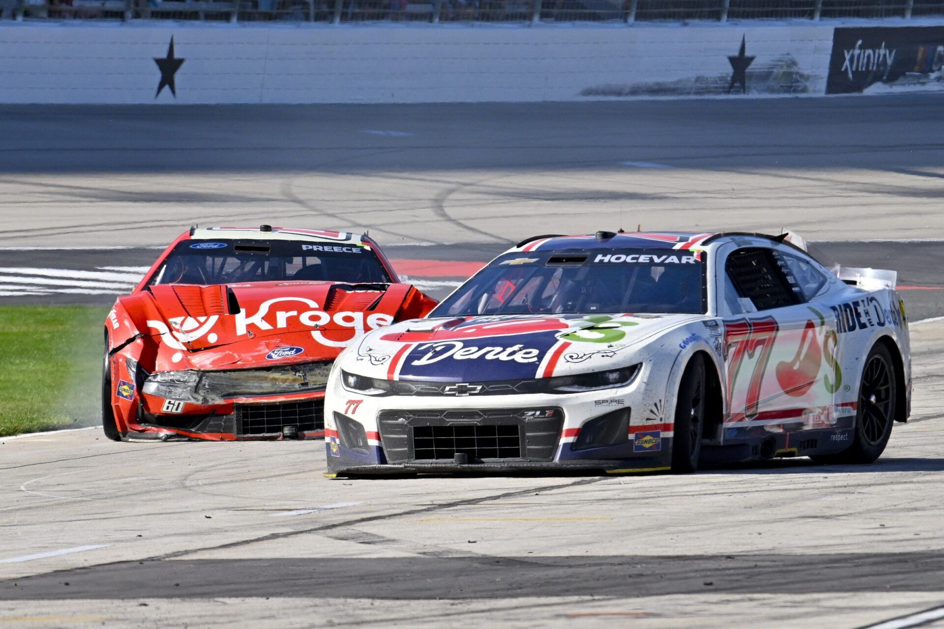 May 4, 2025; Fort Worth, Texas, USA; A view of the damage to the cars of NASCAR Cup Series driver Ryan Preece (60) and driver Carson Hocevar (77) during the Wurth 400 race at Texas Motor Speedway. Mandatory Credit: Jerome Miron-Imagn Images