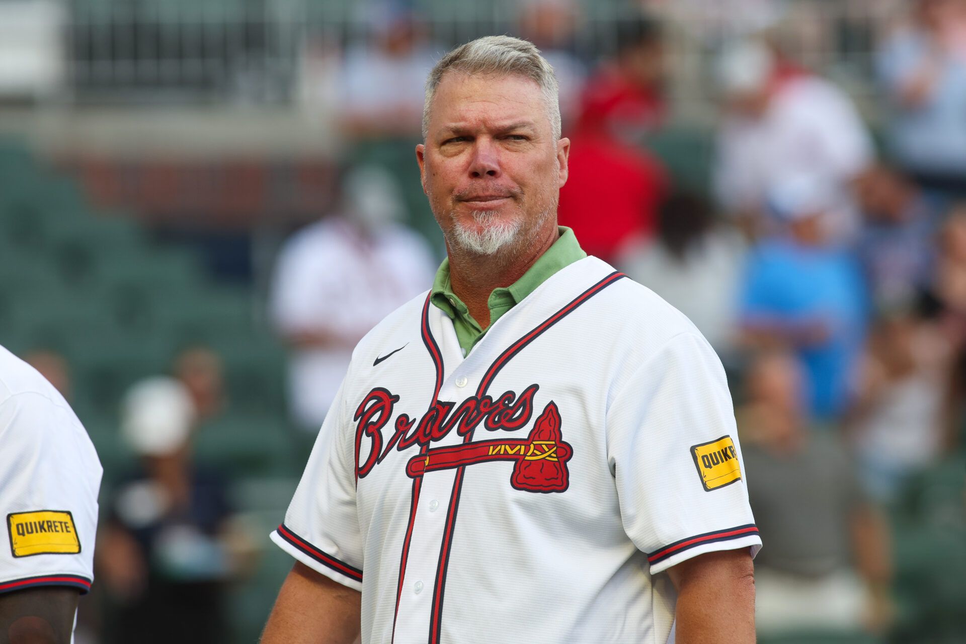 Jul 22, 2024; Atlanta, Georgia, USA; Former Atlanta Braves third baseman Chipper Jones (10) on the field before a game against the Cincinnati Reds at Truist Park. Mandatory Credit: Brett Davis-USA TODAY Sports