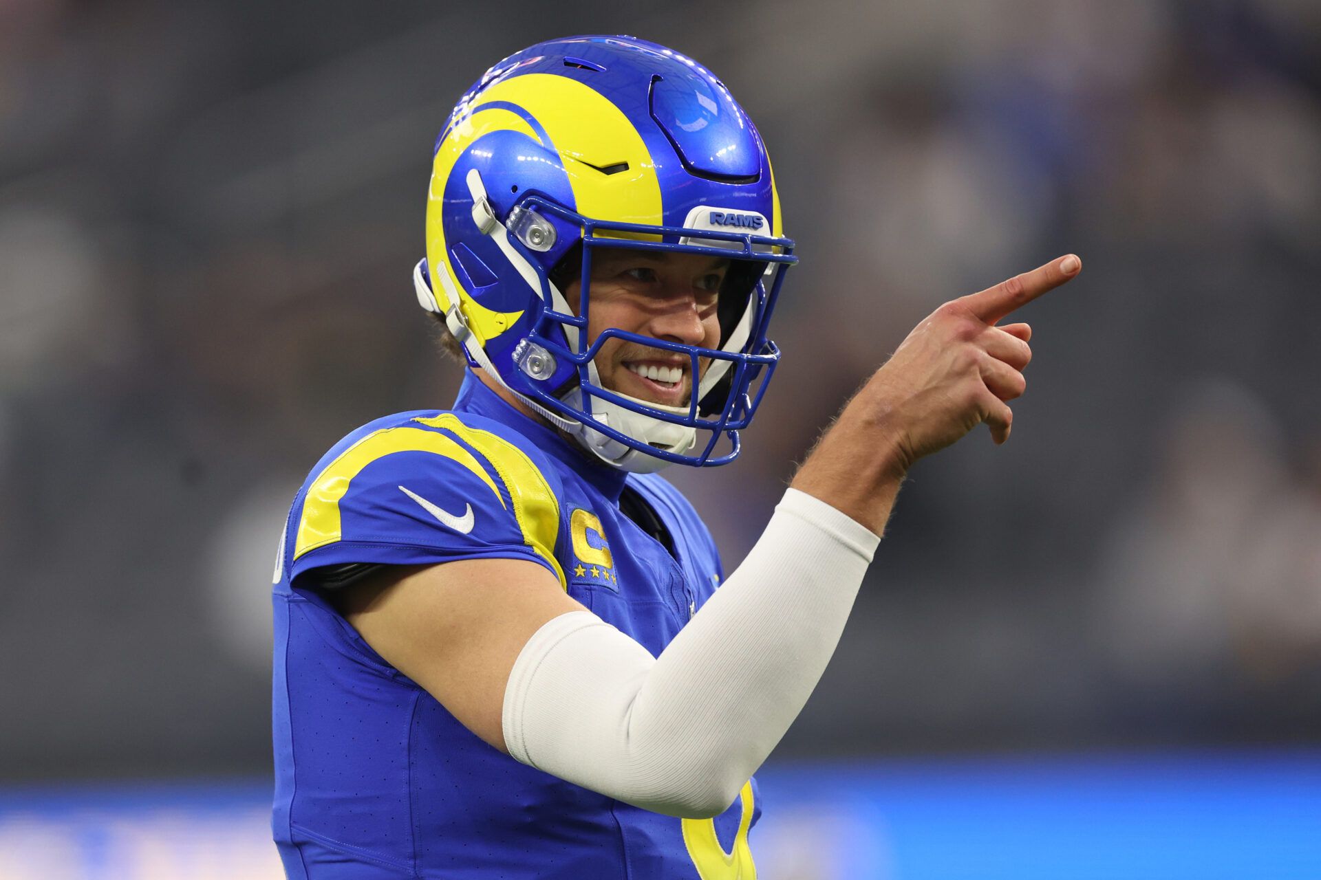INGLEWOOD, CALIFORNIA - DECEMBER 28: Matthew Stafford #9 of the Los Angeles Rams reacts during warm ups prior to the game against the Arizona Cardinals at SoFi Stadium on December 28, 2024 in Inglewood, California. (Photo by Harry How/Getty Images)