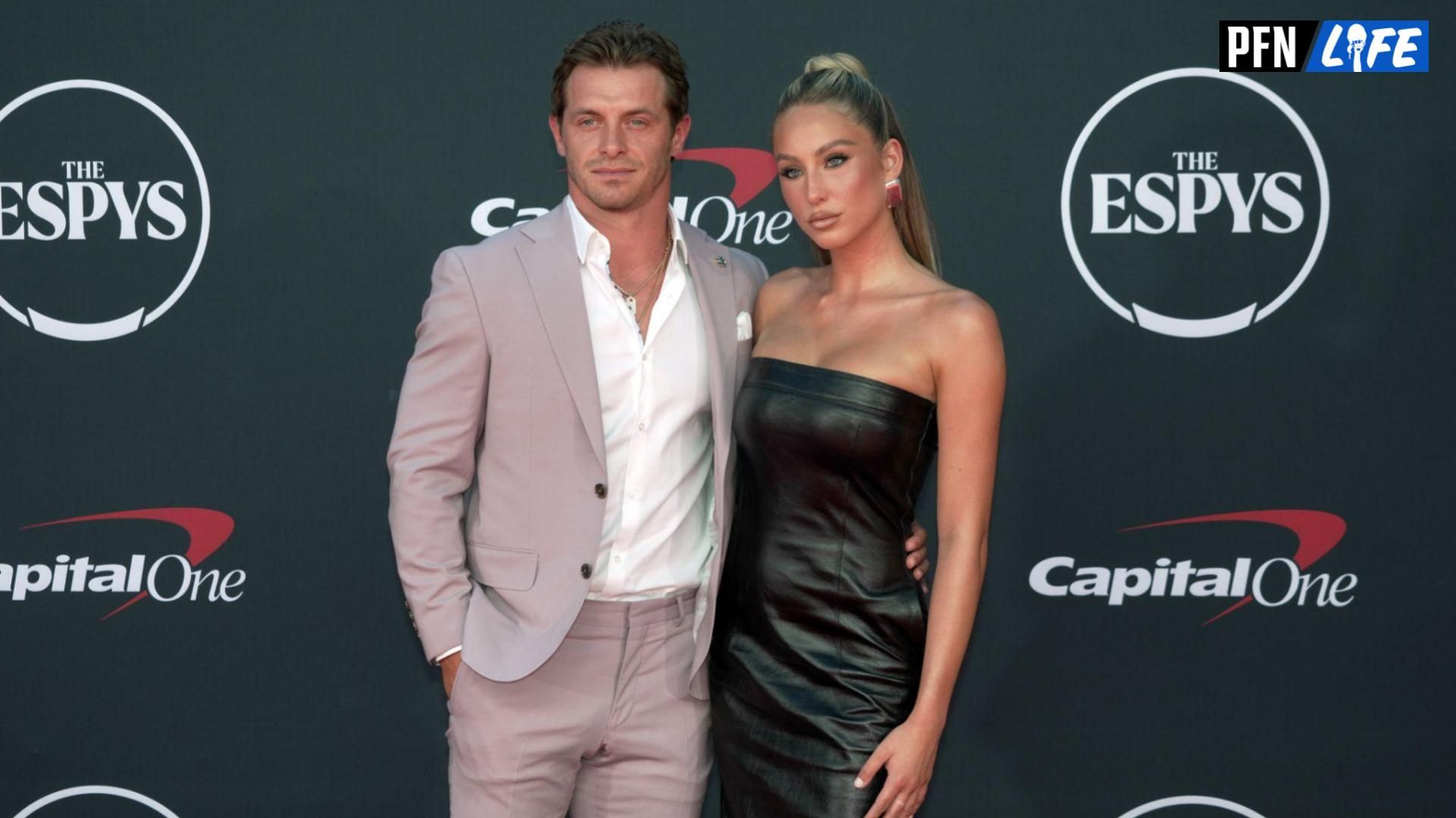 Alix Earle arrives with Braxton Berrios on the red carpet before the 2023 ESPYS at the Dolby Theatre.