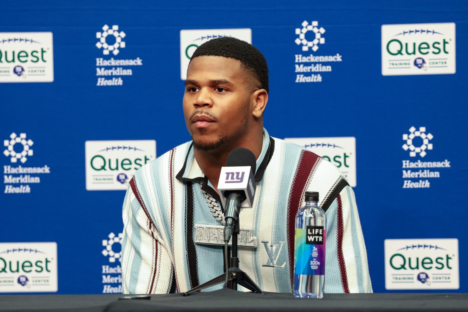Apr 25, 2025; East Rutherford, NJ, US; New York Giants first round draft pick, Abdul Carter, takes questions from the media during his introduction press conference. New York Giants Mandatory Credit: Thomas Salus-Imagn Images