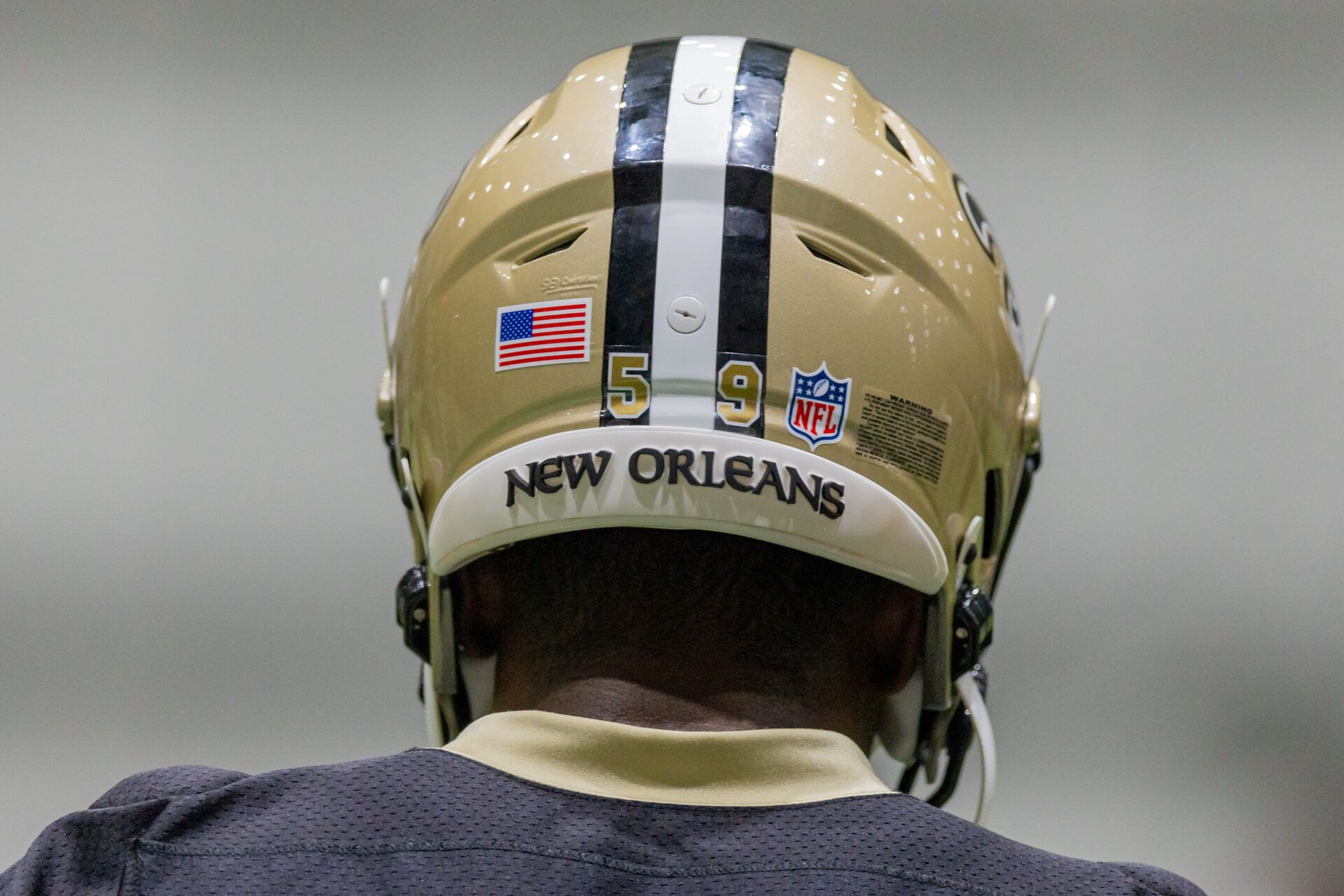 Detailed view of the New Orleans Saints helmet during rookie minicamp at Ochsner Sports Performance Center.
