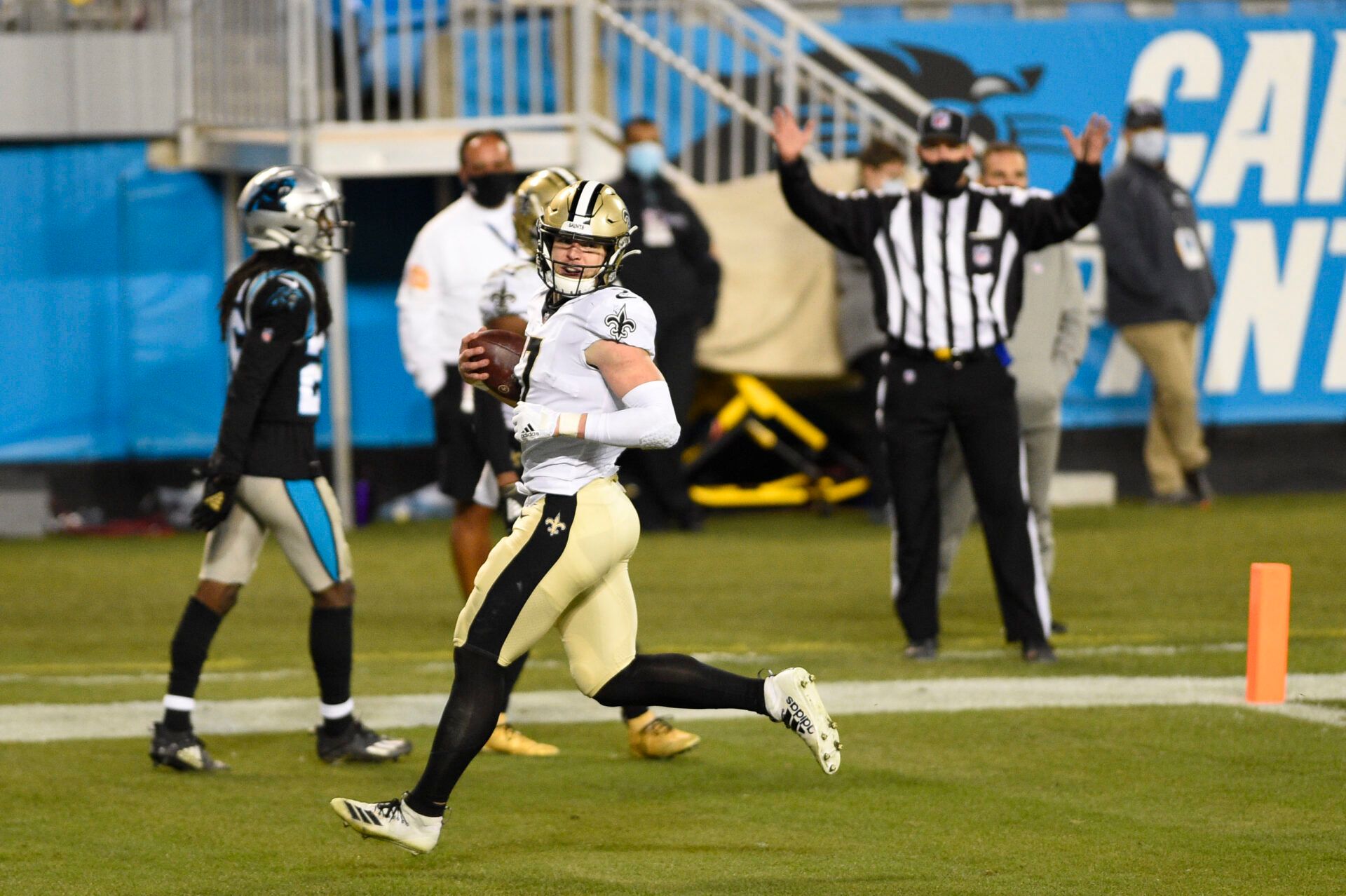 Jan 3, 2021; Charlotte, North Carolina, USA; New Orleans Saints quarterback Taysom Hill (7) scores a touchdown in the third quarter at Bank of America Stadium. Mandatory Credit: Bob Donnan-USA TODAY Sports
