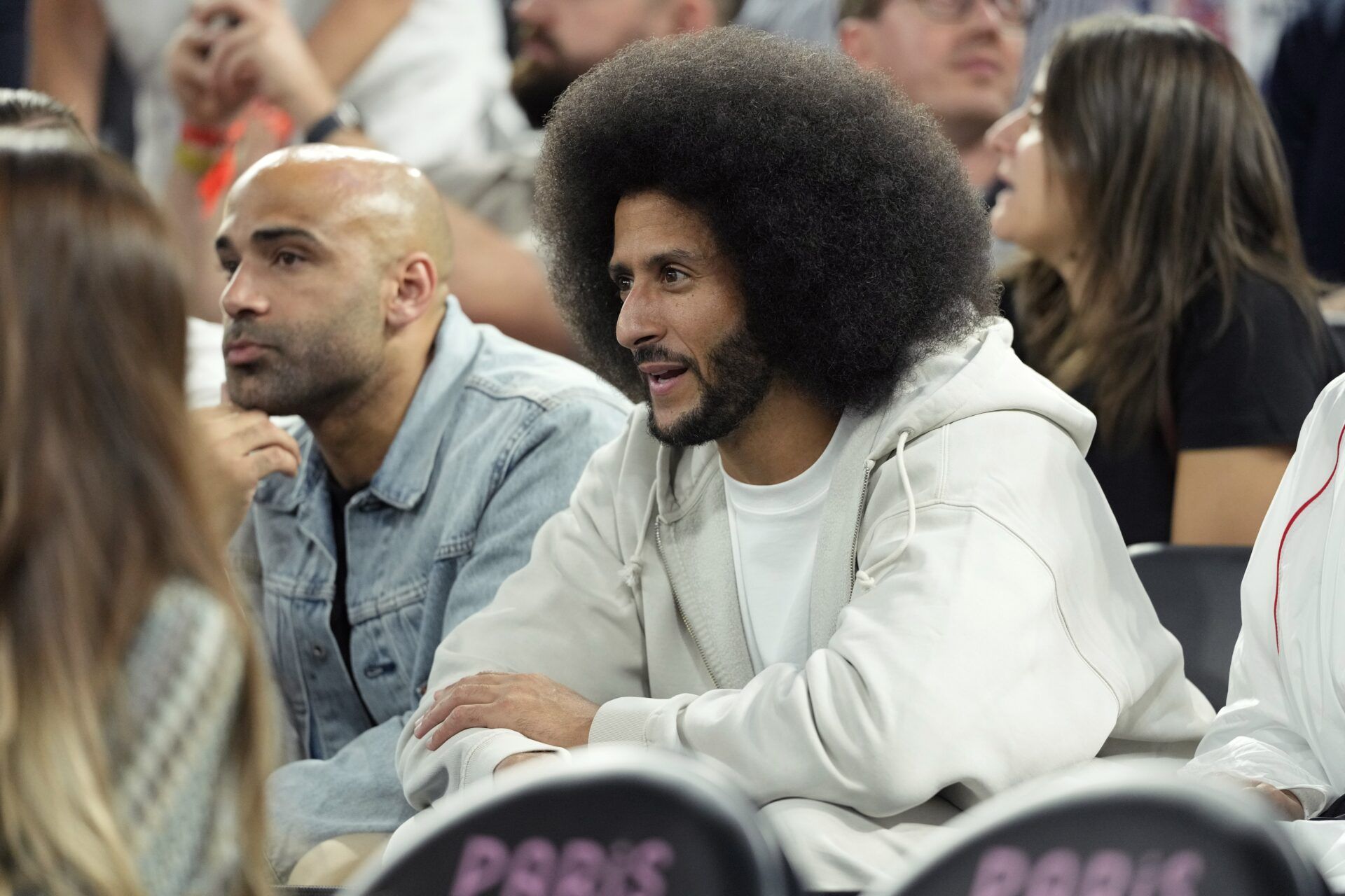 Aug 8, 2024; Paris, France; Former NFL player Colin Kaepernick looks on during the first half between the United States and Serbia in a men's basketball semifinal game during the Paris 2024 Olympic Summer Games at Accor Arena. Mandatory Credit: Kyle Terada-USA TODAY Sports
