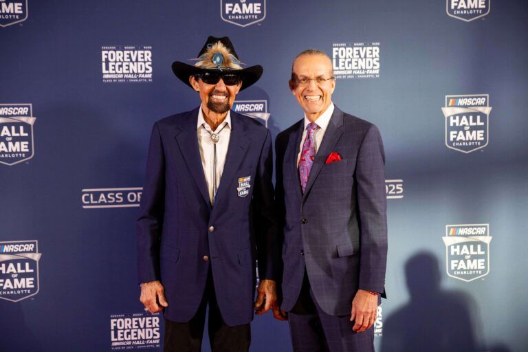 Feb 7, 2025; Charlotte, NC, USA; Former NASCAR drivers Richard Petty and son Kyle Petty on the red carpet before the 2025 NASCAR Hall of Fame Induction Ceremony at Charlotte Convention Center Crown Ballroom. Mandatory Credit: Scott Kinser-Imagn Images