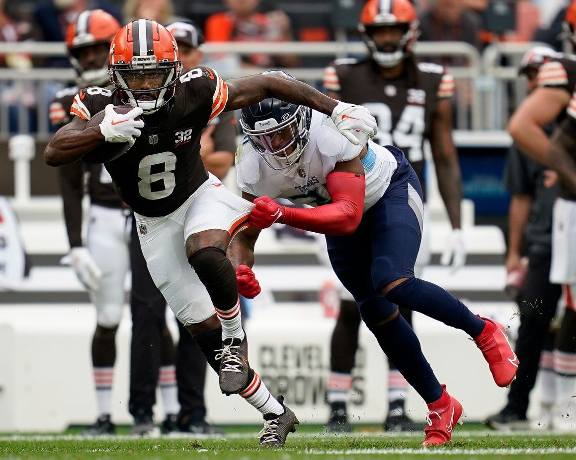 Tennessee Titans safety Kevin Byard (31) tackles Cleveland Browns wide receiver Elijah Moore (8) during the third quarter in Cleveland, Ohio, Sunday, Sept. 24, 2023.