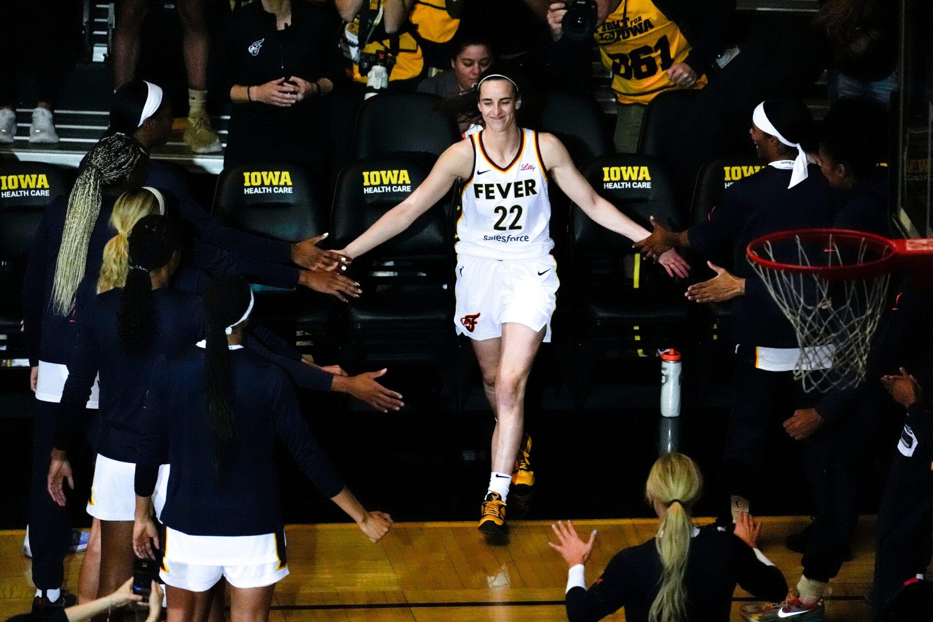 Indiana Fever guard Caitlin Clark (22) is announced ahead of a WNBA preseason game against the Brazil National Team May 4, 2025 at Carver-Hawkeye Arena in Iowa City, Iowa.