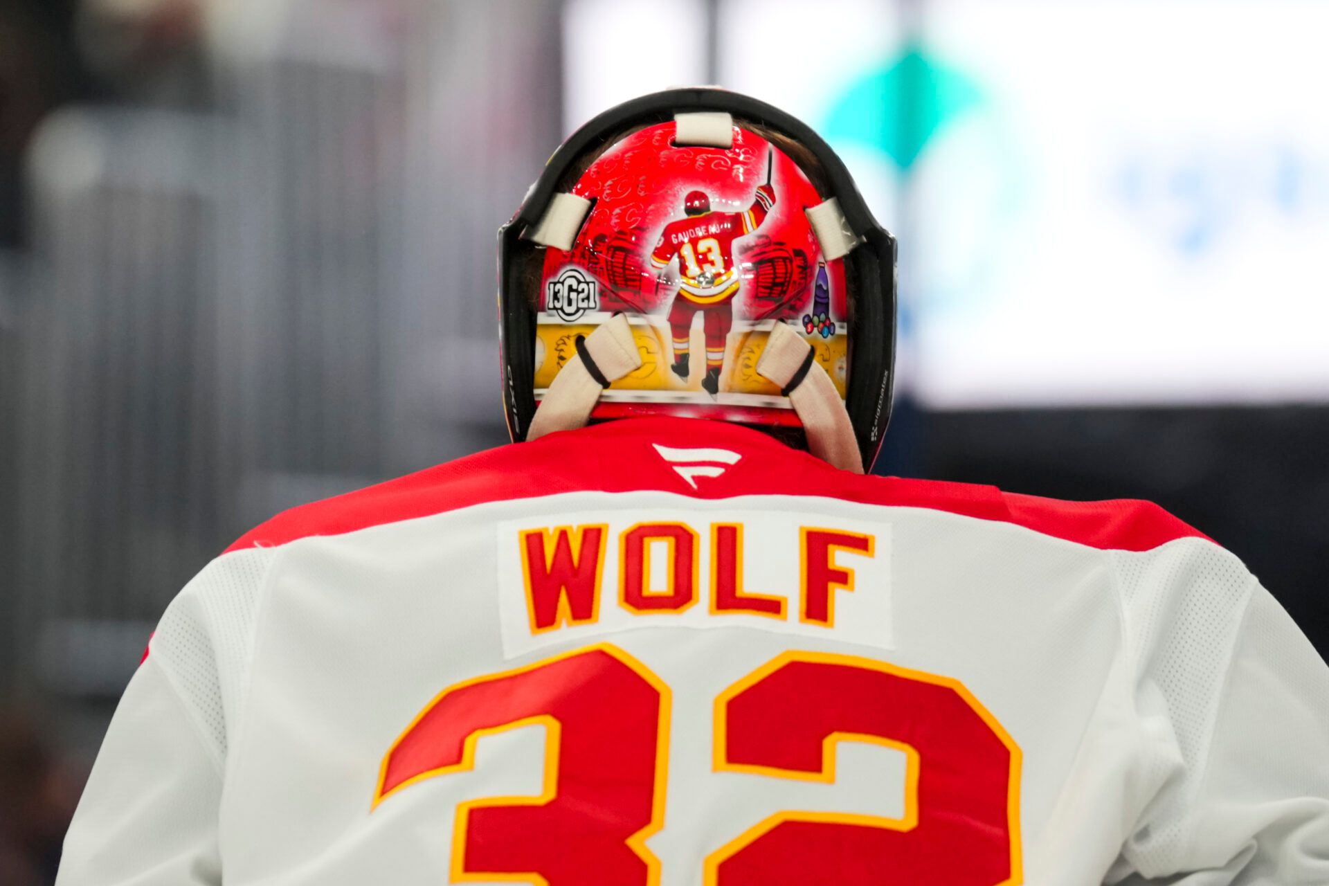 Nov 29, 2024; Columbus, Ohio, USA; Calgary Flames goaltender Dustin Wolf (32) wears a tribute to the late Johnny Gaudreau on his helmet in the game against the Columbus Blue Jackets in the second period at Nationwide Arena. Mandatory Credit: Aaron Doster-Imagn Images
