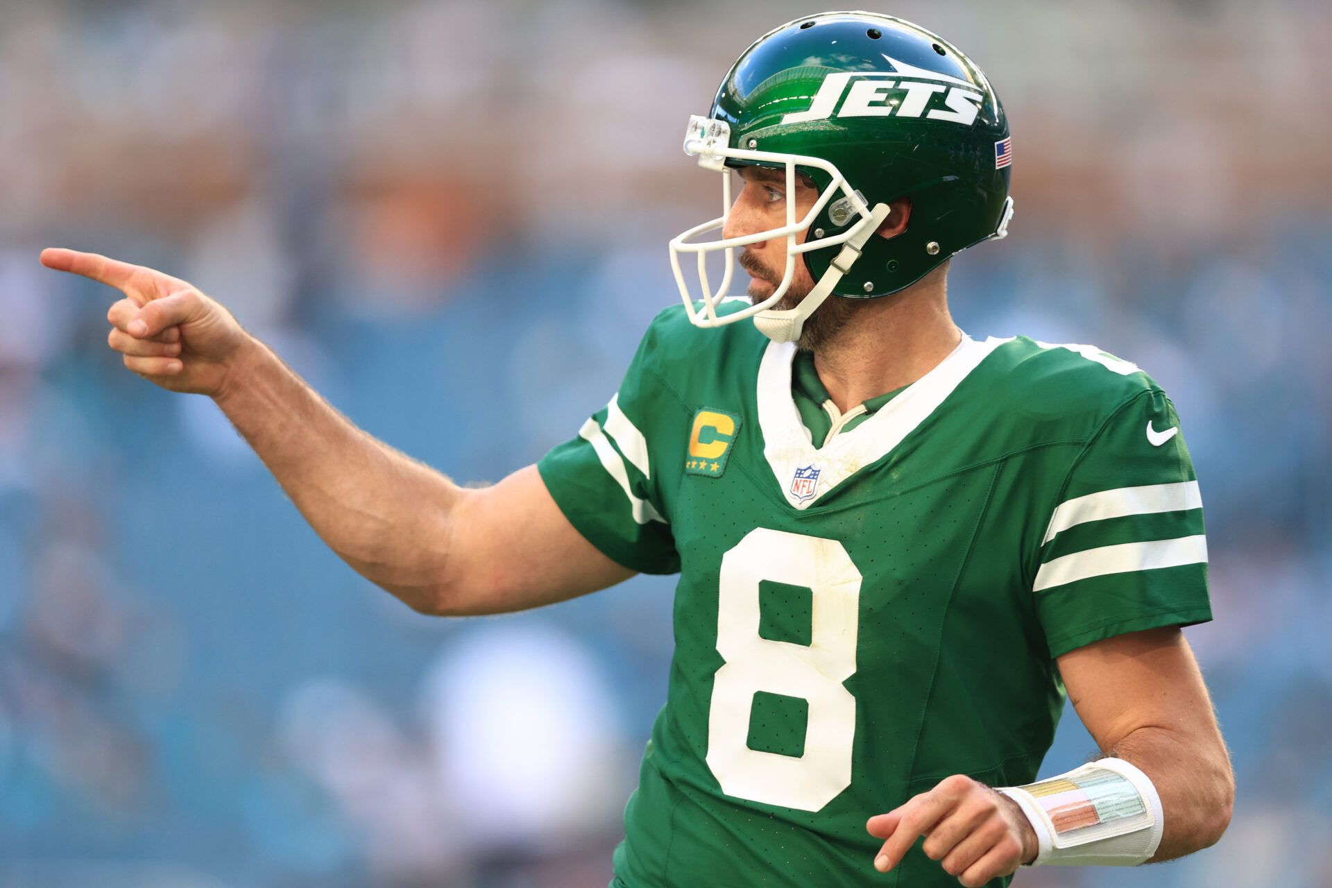 MIAMI GARDENS, FLORIDA - DECEMBER 08: Aaron Rodgers #8 of the New York Jets reacts after a touchdown in the third quarter of a game against the Miami Dolphins at Hard Rock Stadium on December 08, 2024 in Miami Gardens, Florida. (Photo by Megan Briggs/Getty Images)