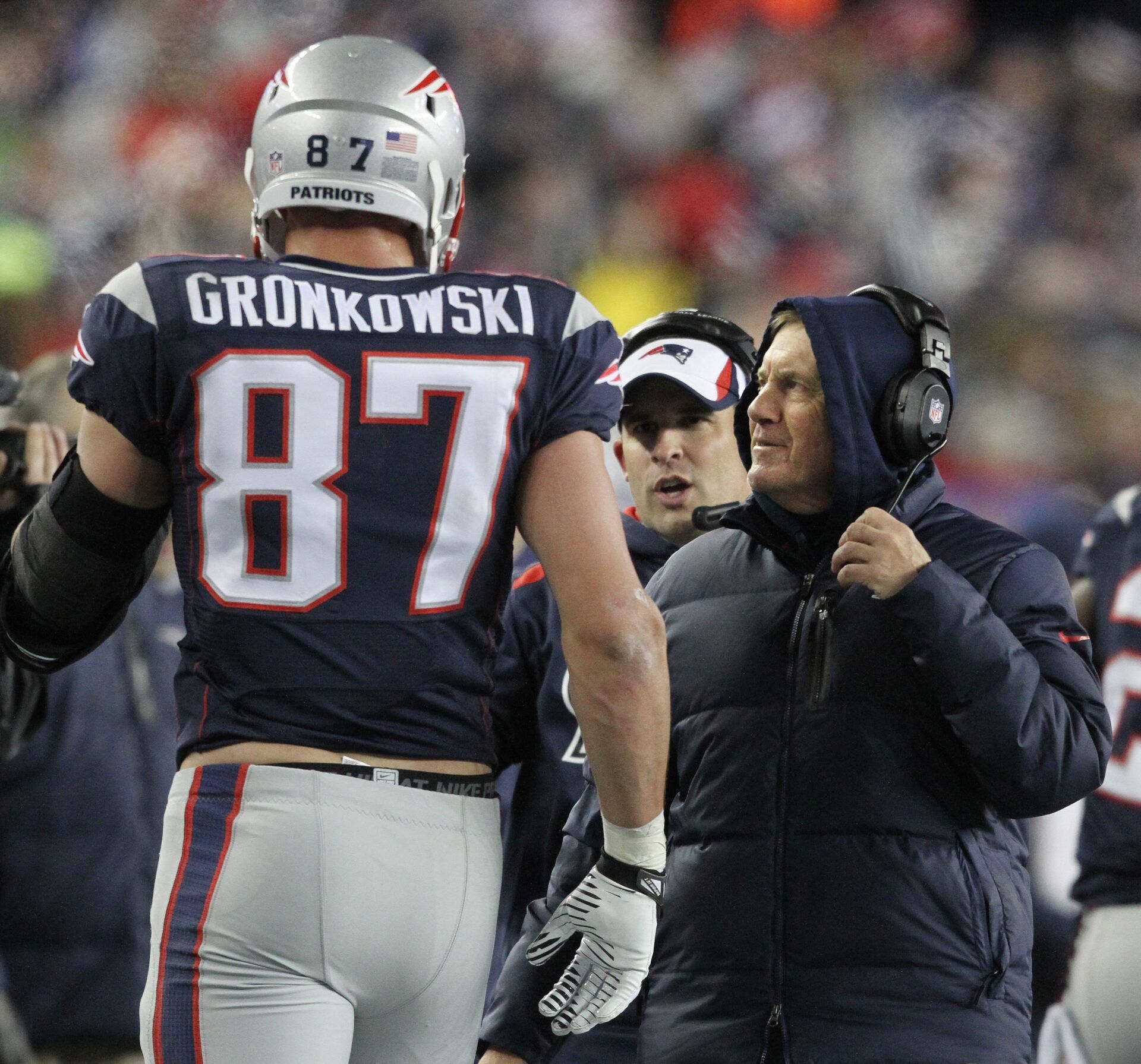 2013: Patriots head coach Bill Belichick talks with tight end Rob Gronkowski in the first half as the New England Patriots host the Pittsburgh Steelers at Gillette Stadium.