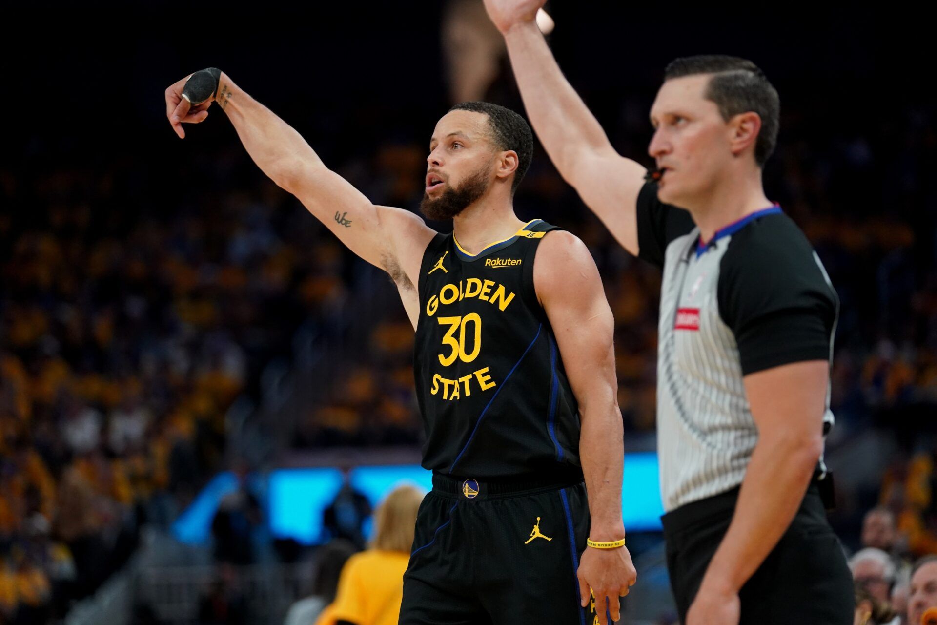 Golden State Warriors guard Stephen Curry (30) reacts after making a three-point basket against the Houston Rockets in the third quarter of game six of the first round for the 2025 NBA Playoffs at Chase Center.