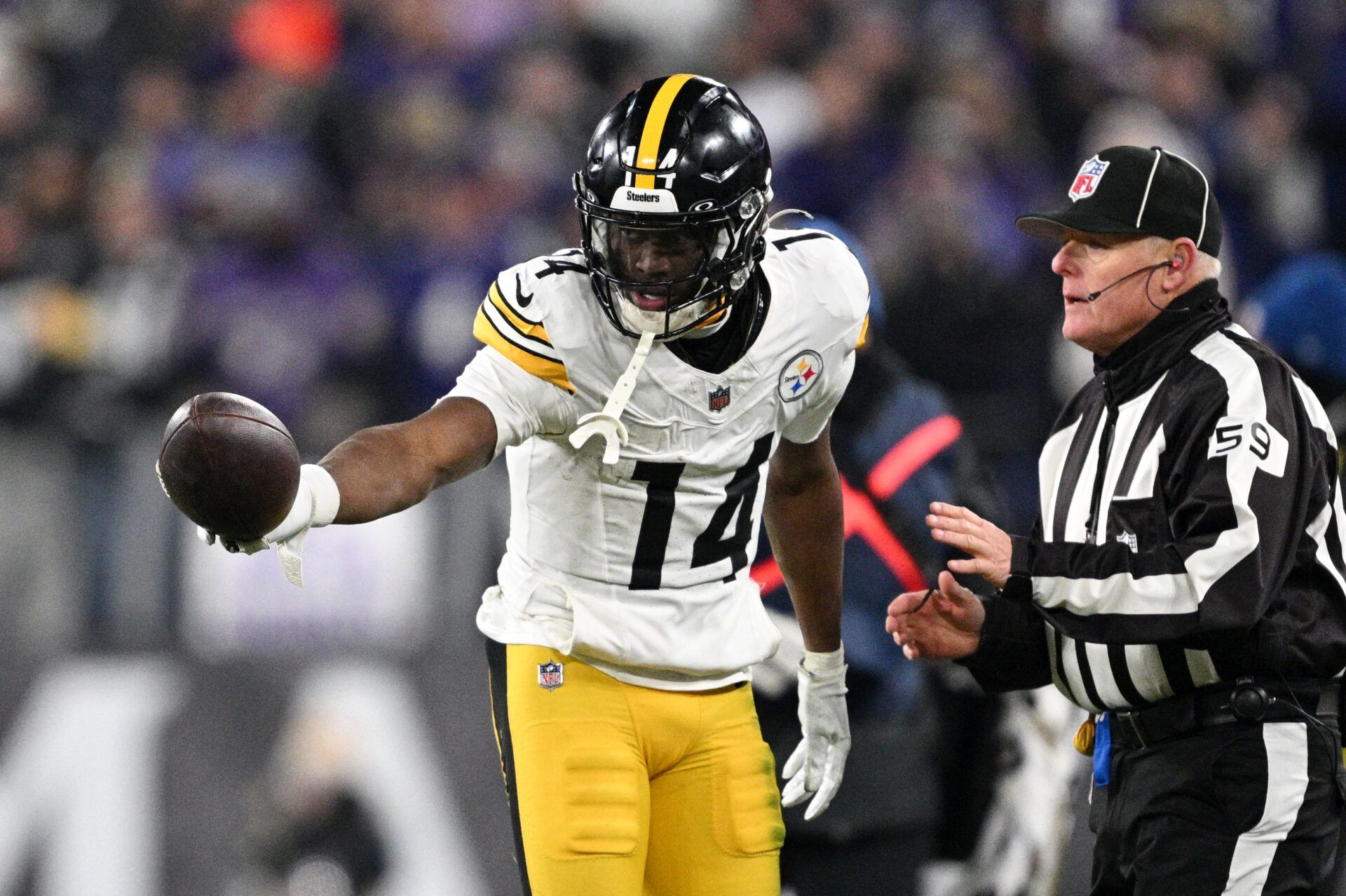 Jan 11, 2025; Baltimore, Maryland, USA; Pittsburgh Steelers wide receiver George Pickens (14) reacts after a catch against the Baltimore Ravens in the fourth quarter in an AFC wild card game at M&T Bank Stadium. Mandatory Credit: Tommy Gilligan-Imagn Images