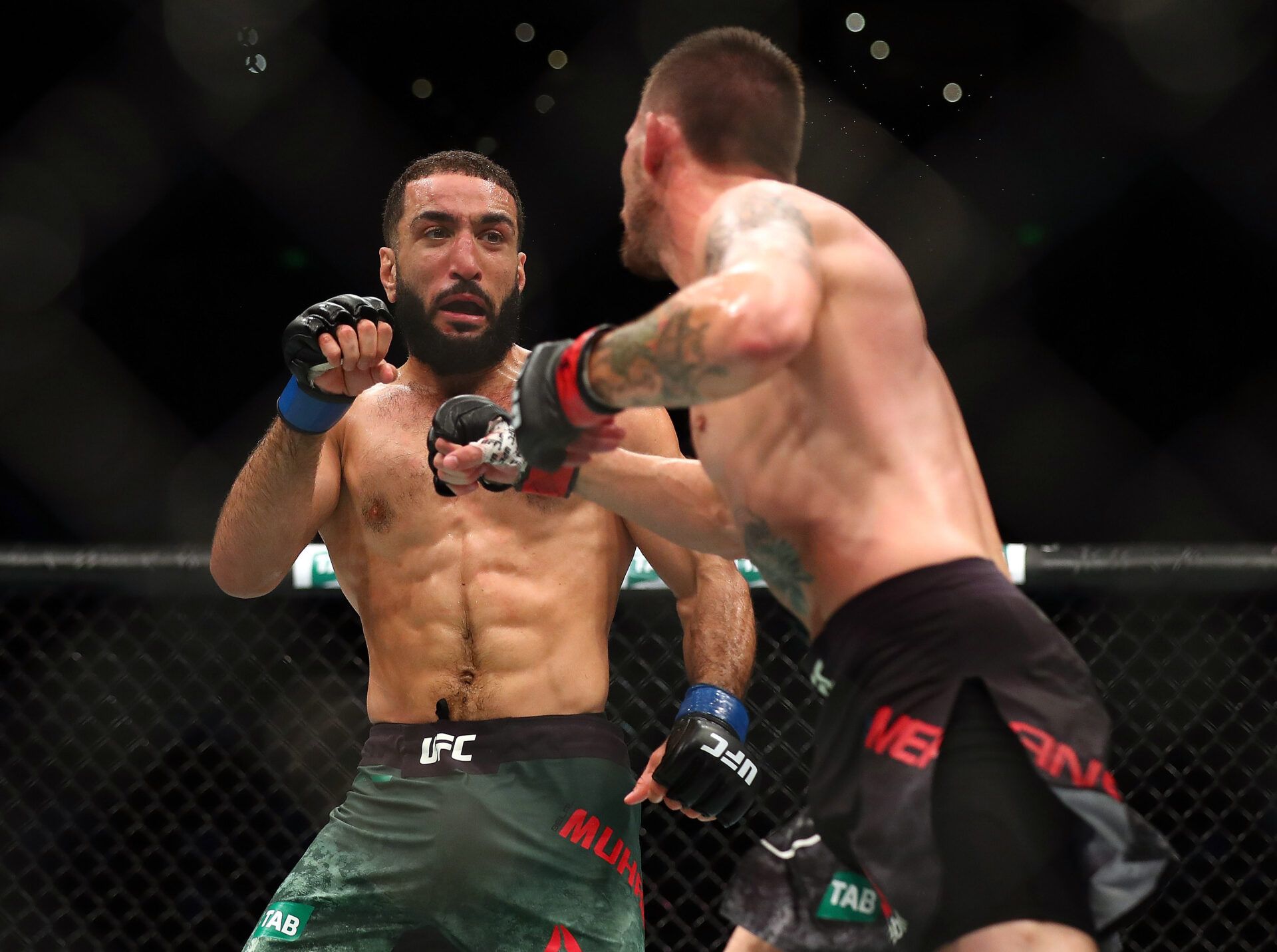 Nov 18, 2017; Sydney, Australia; Tim Means moves in with a hit as Belal Muhammad defends during UFC Fight Night at Qudos Bank Arena. Mandatory Credit: Christopher Hyde-USA TODAY Sports